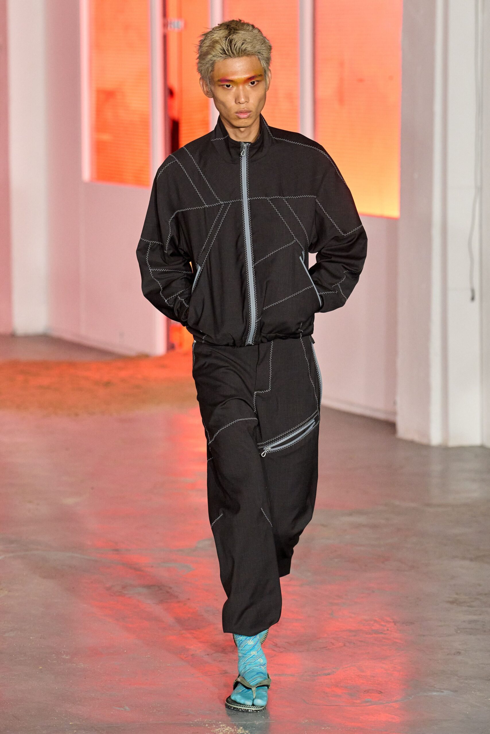 black cotton long-sleeve collared fitted zippered buttoned jacket