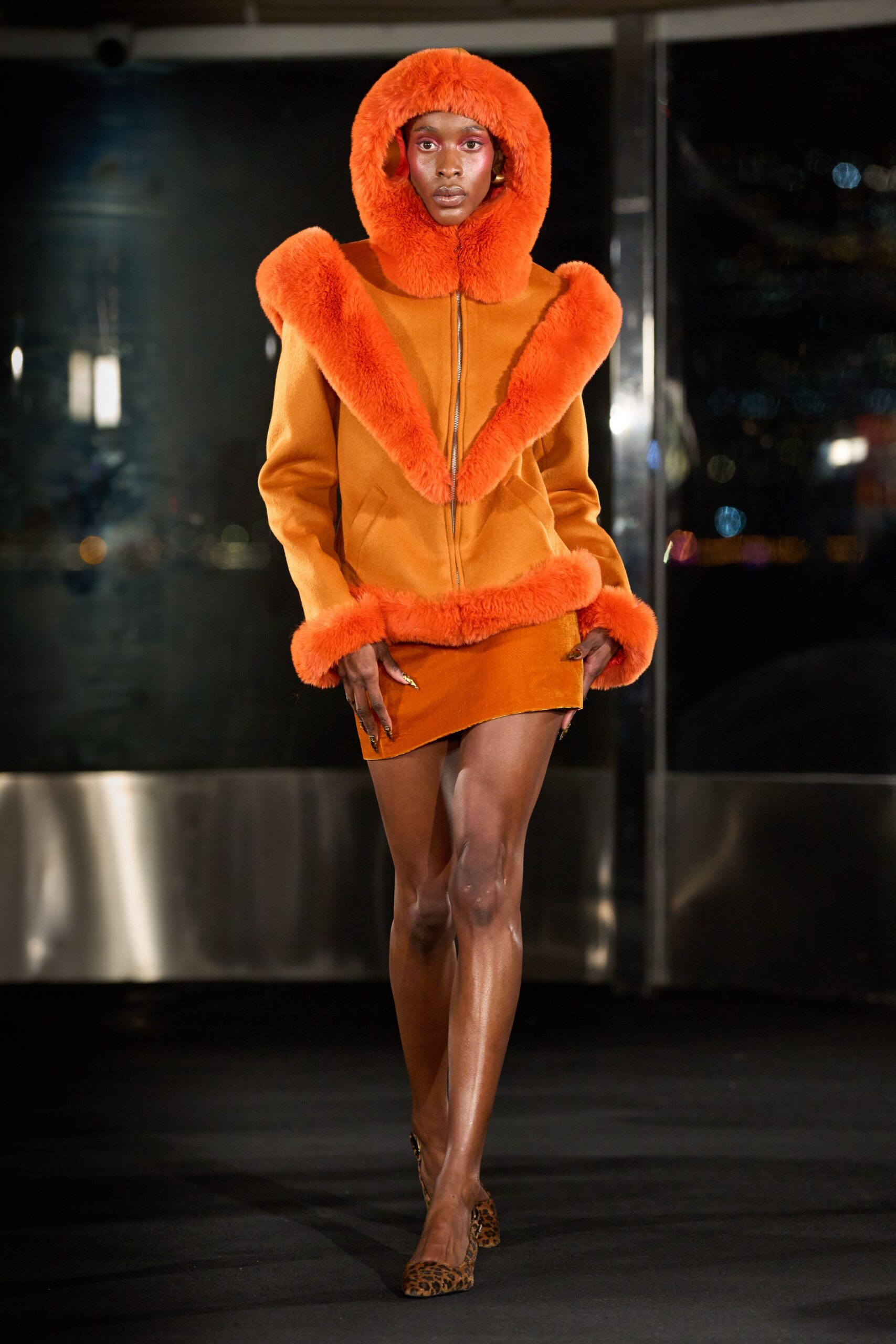 orange faux-fur coat and mini dress