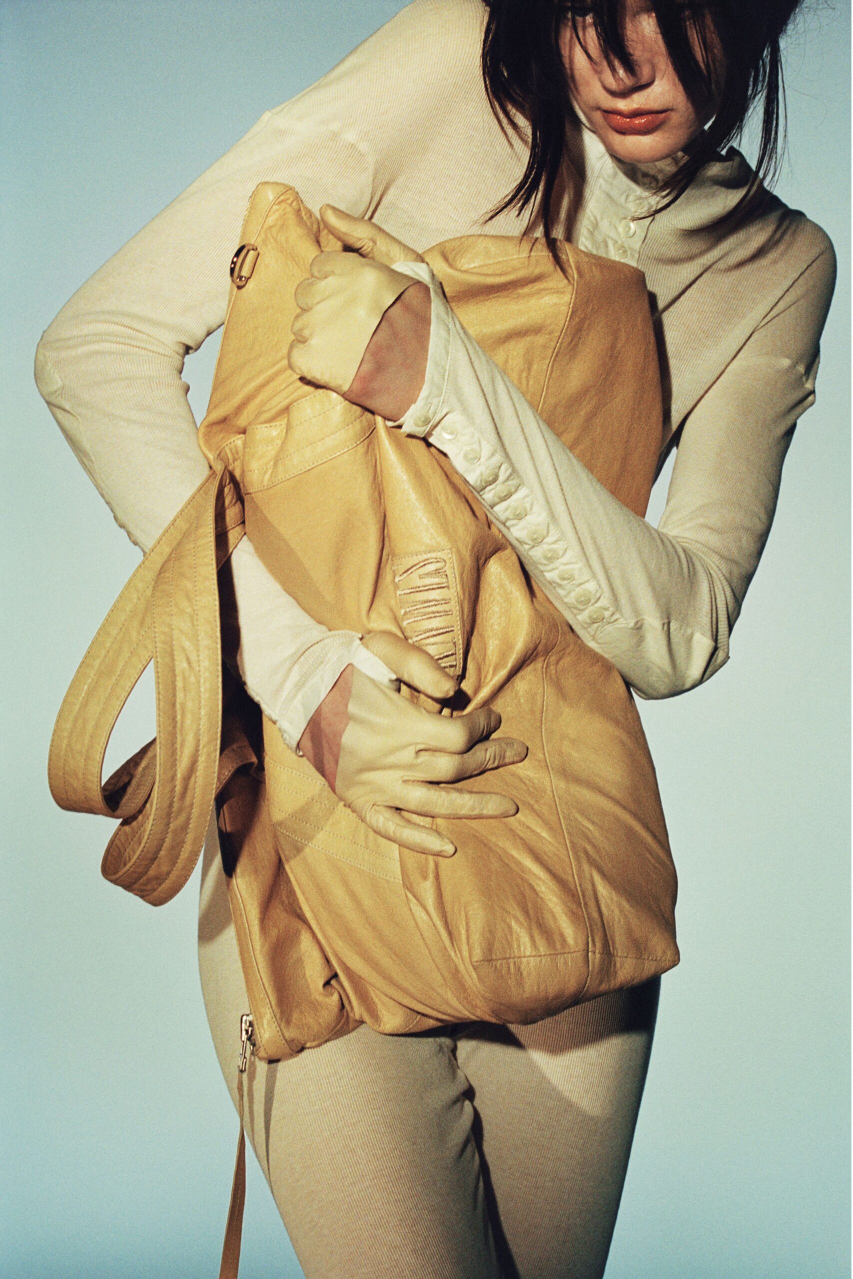 beige cotton long-sleeve high-neck fitted bodysuit