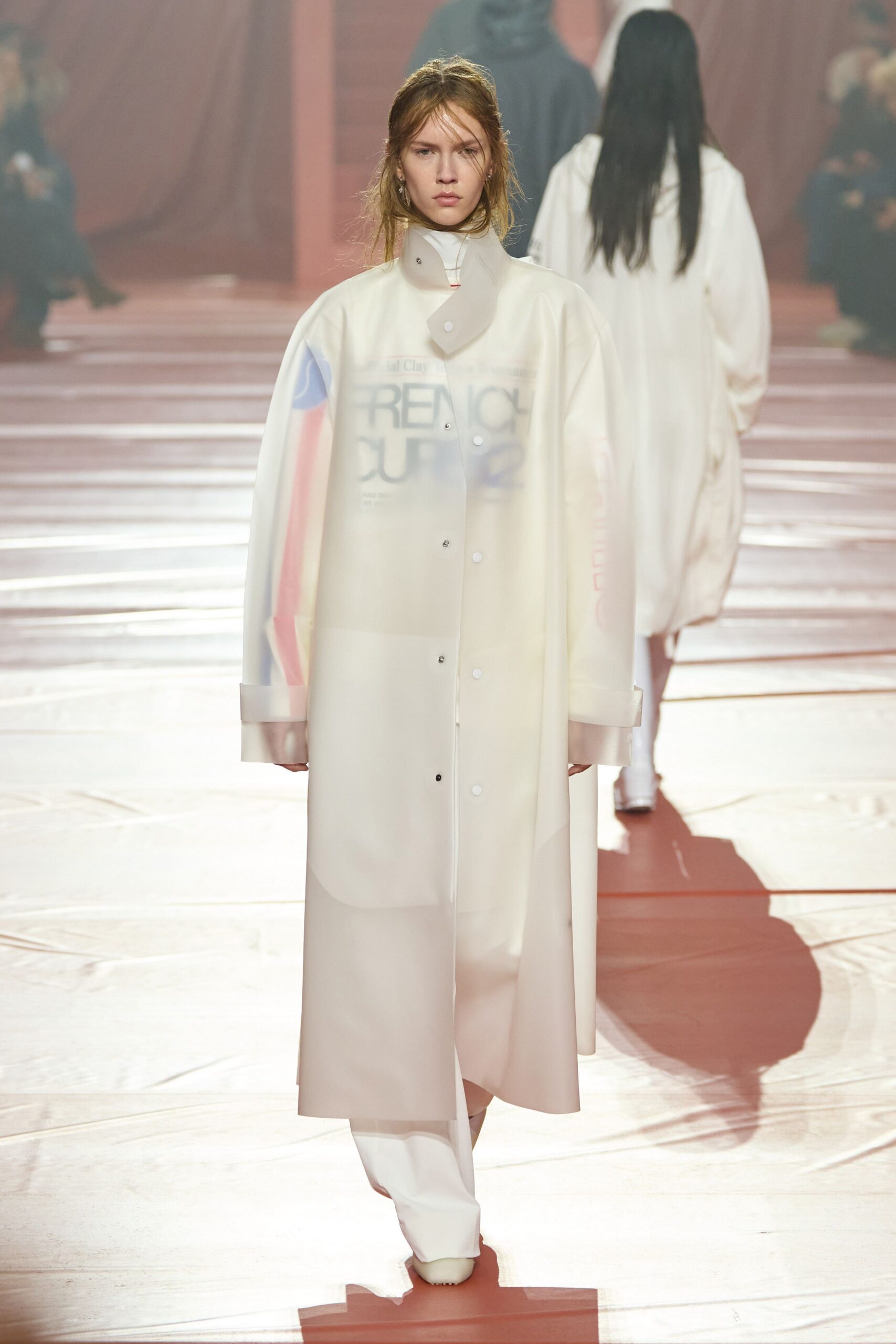 white vinyl long-sleeve collared relaxed buttoned sheer coat