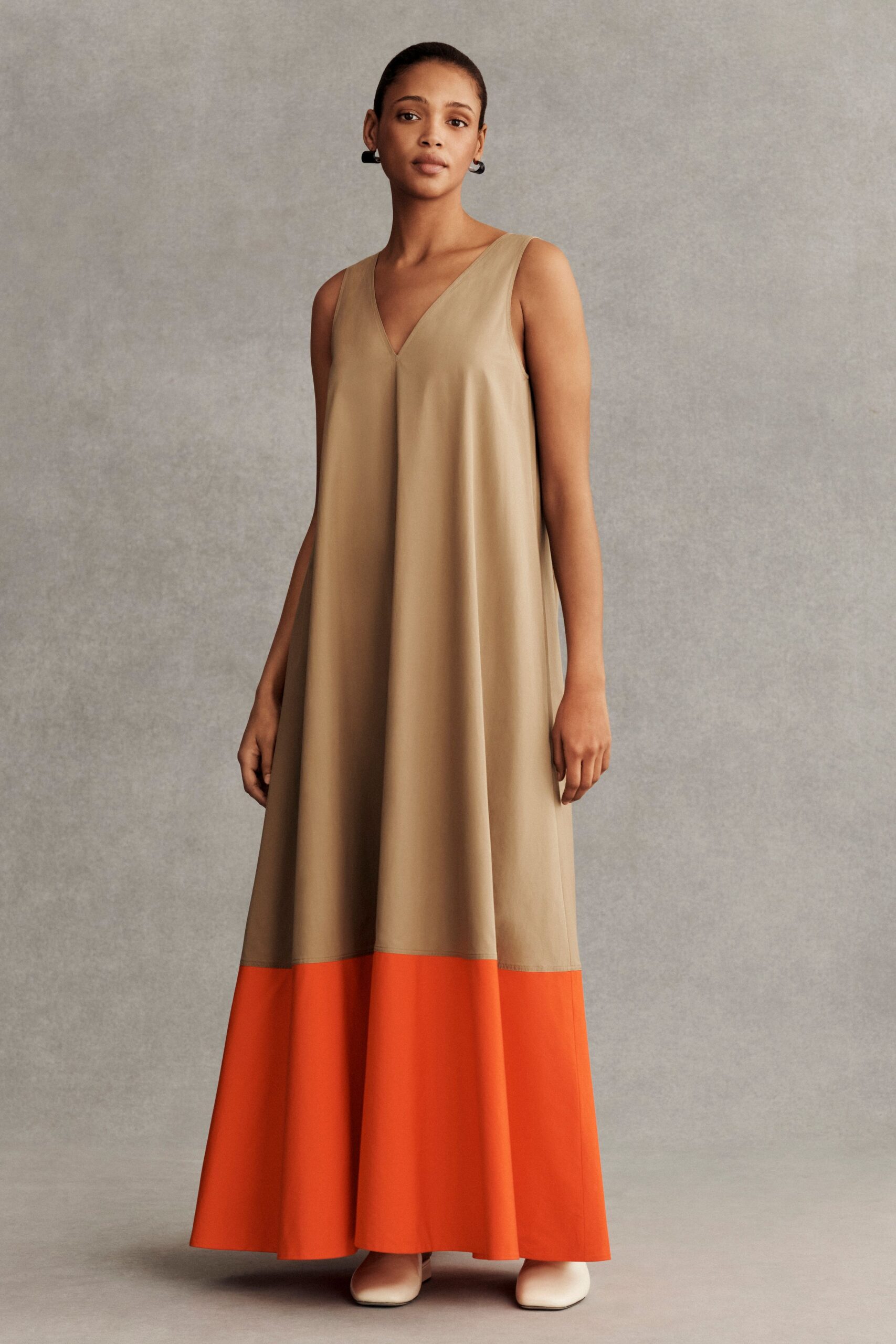 beige color-blocked maxi gown with shoes