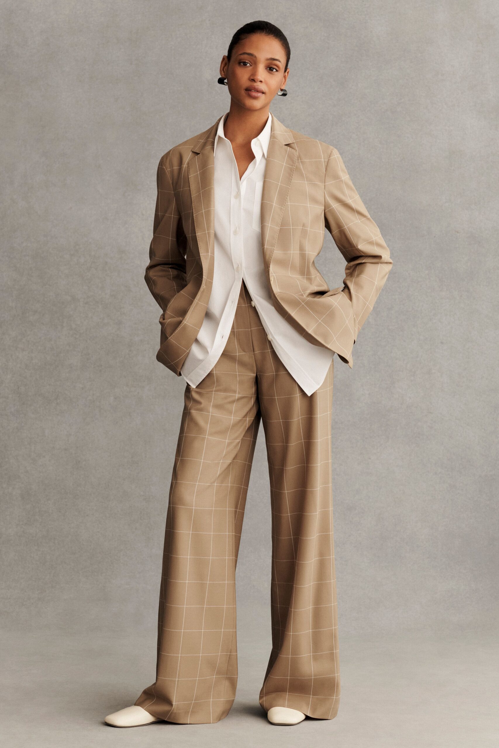 beige tailored blazer with white shirt