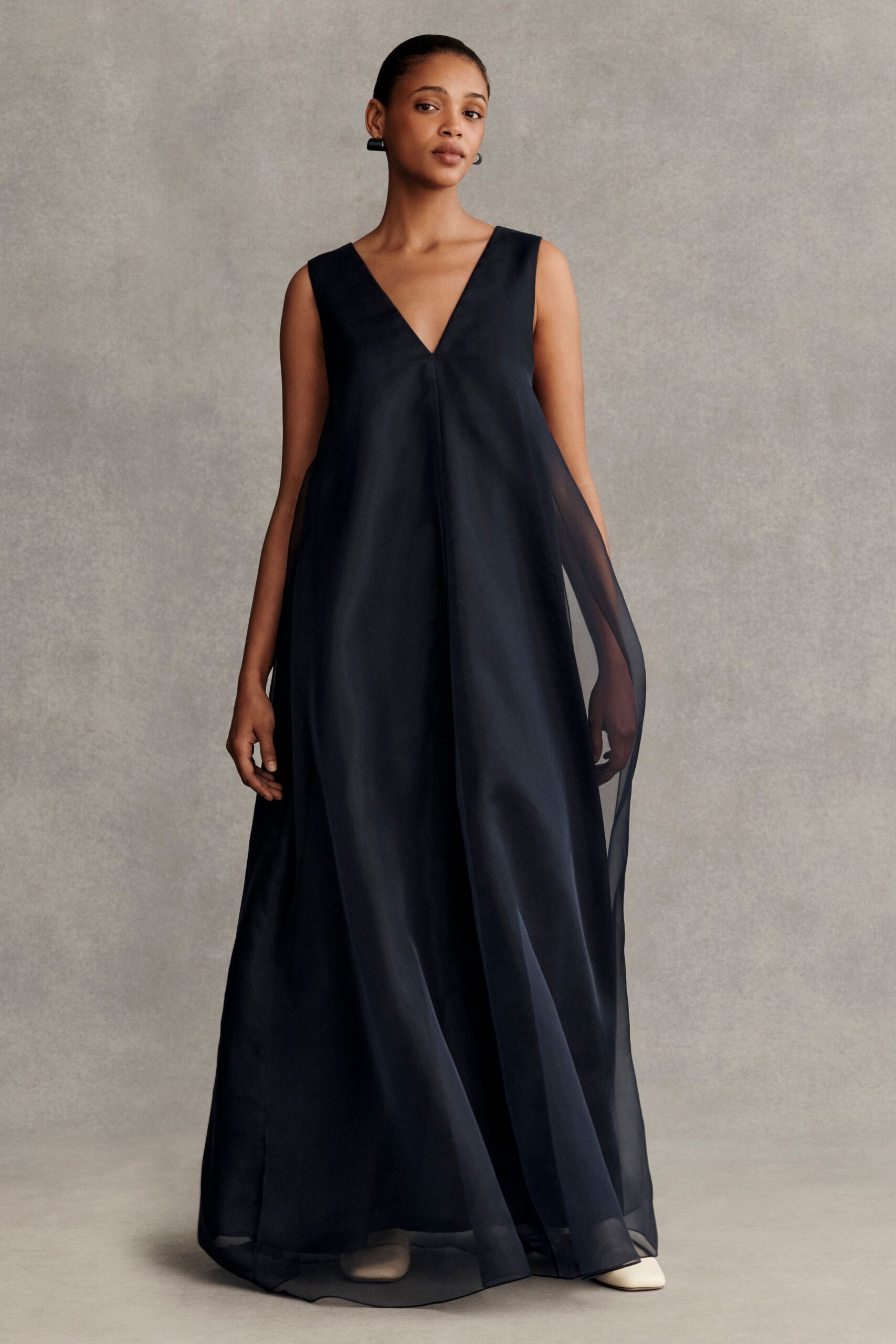 black silk sleeveless gown