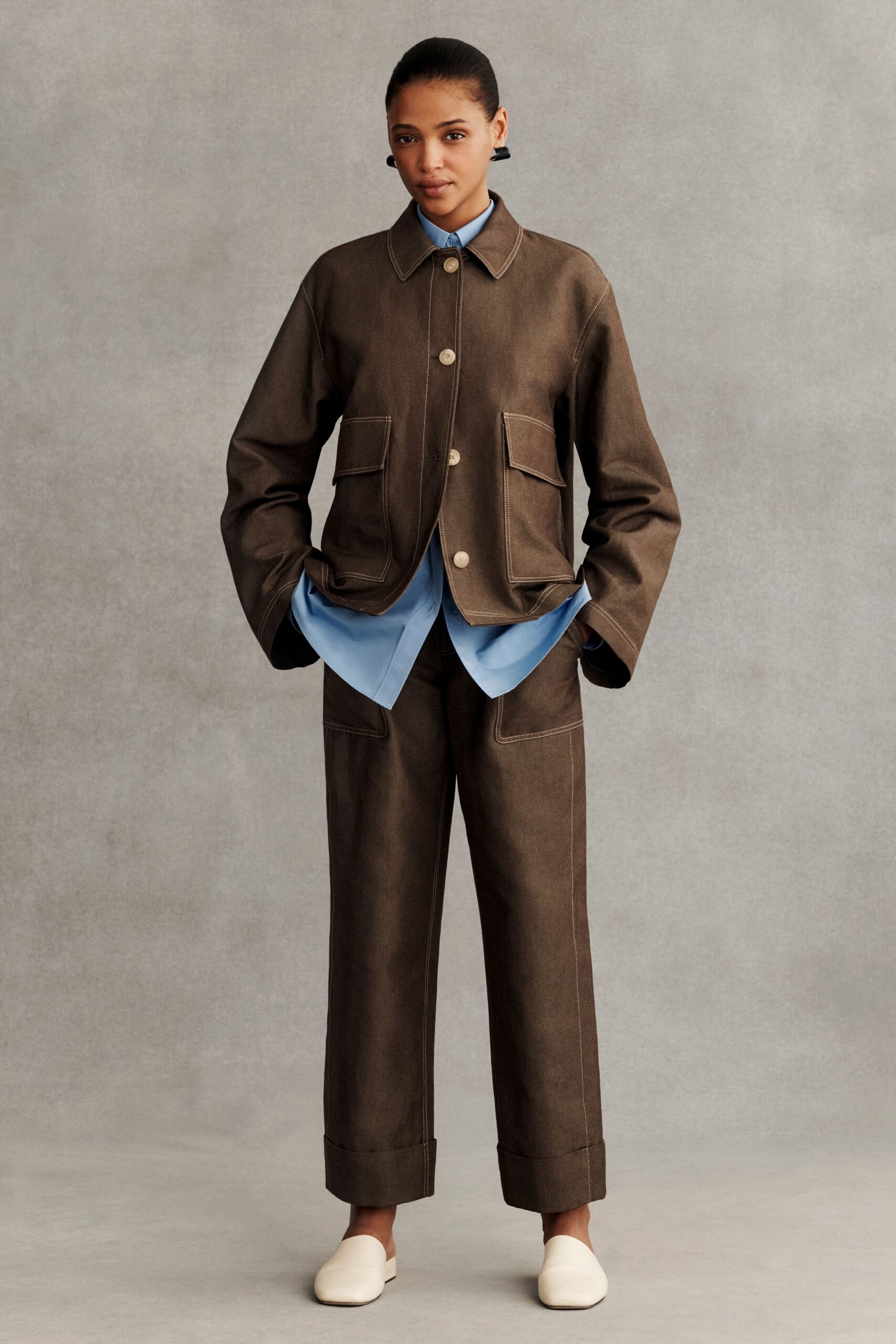 brown relaxed jacket with blue shirt