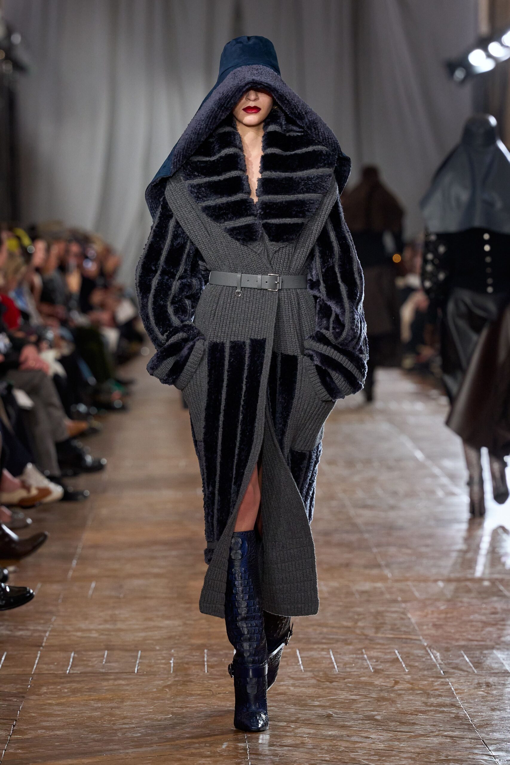 black fur coat with belt and boots