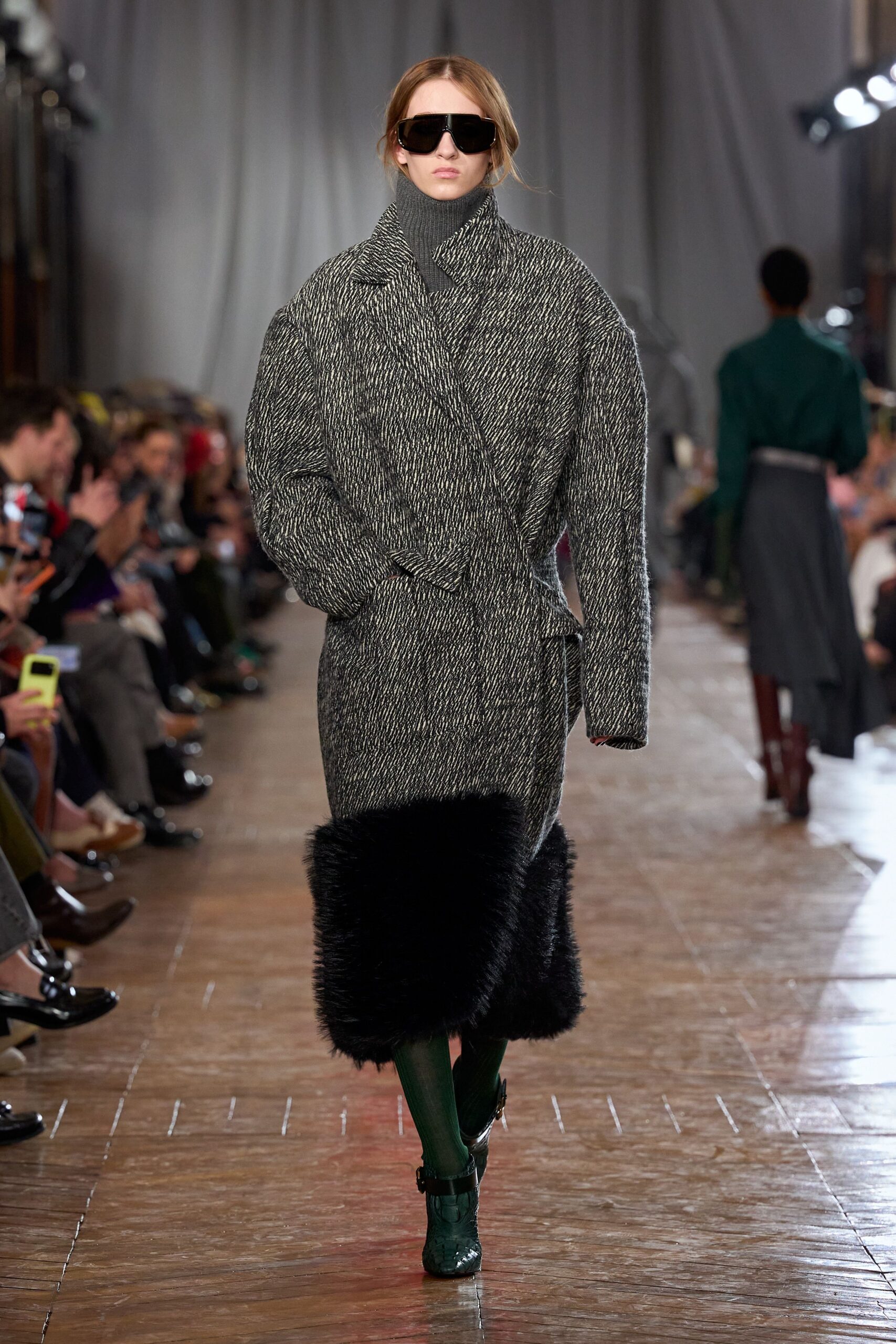 black wool long-sleeve collared oversized buttoned layered coat
