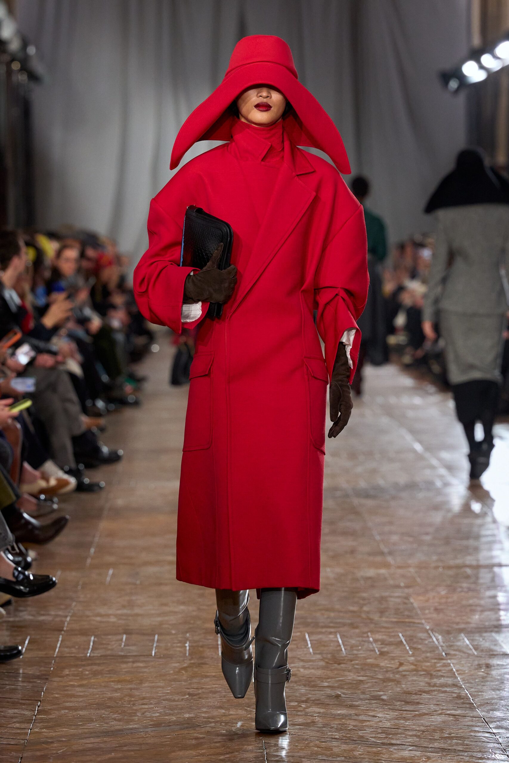red wool long-sleeve collared oversized buttoned coat