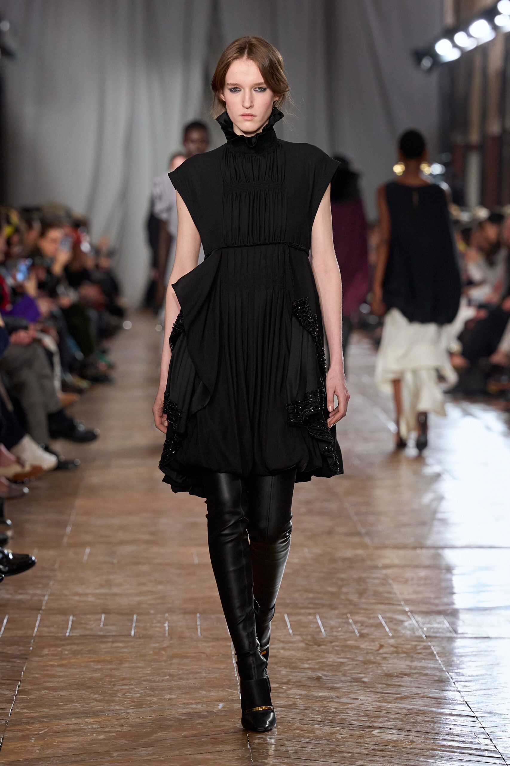 black silk sleeveless high-neck fitted pleated layered dress