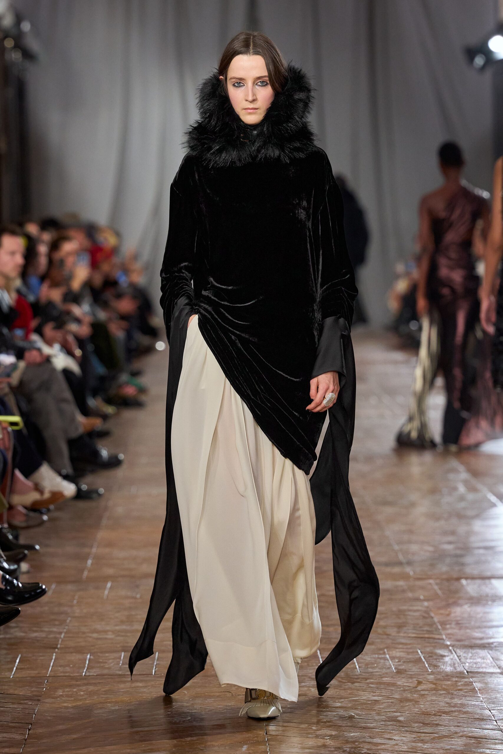 black velvet gown with gold shoes