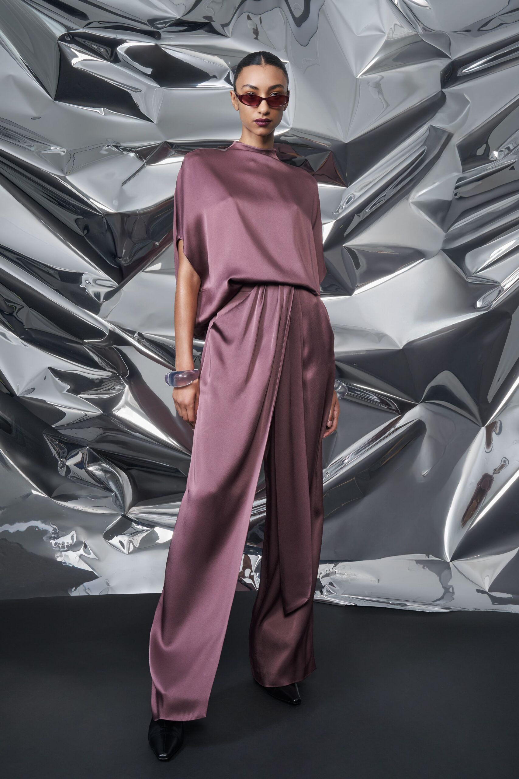 purple satin short-sleeve high-neck relaxed wide-leg shiny jumpsuit
