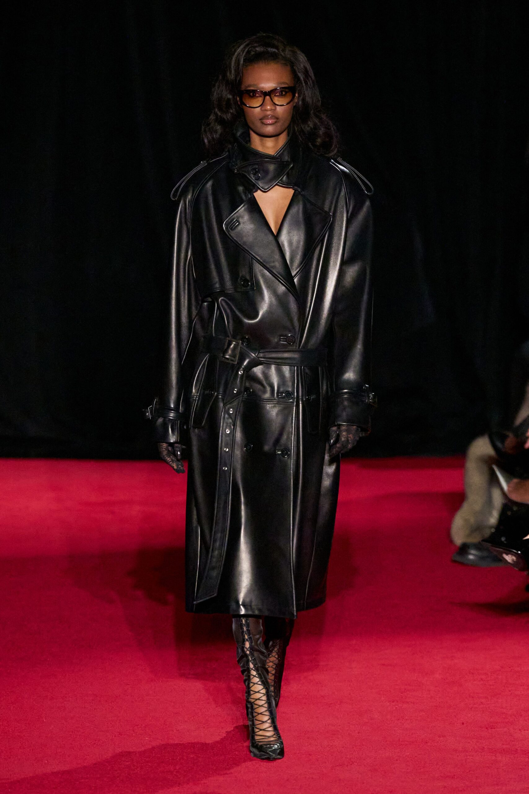 black leather long-sleeve v-neck fitted zippered belted coat