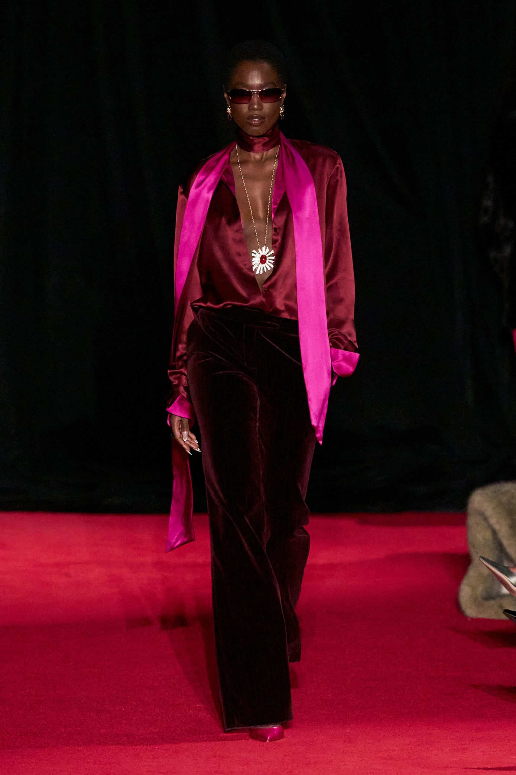 red silk shirt with flared pants