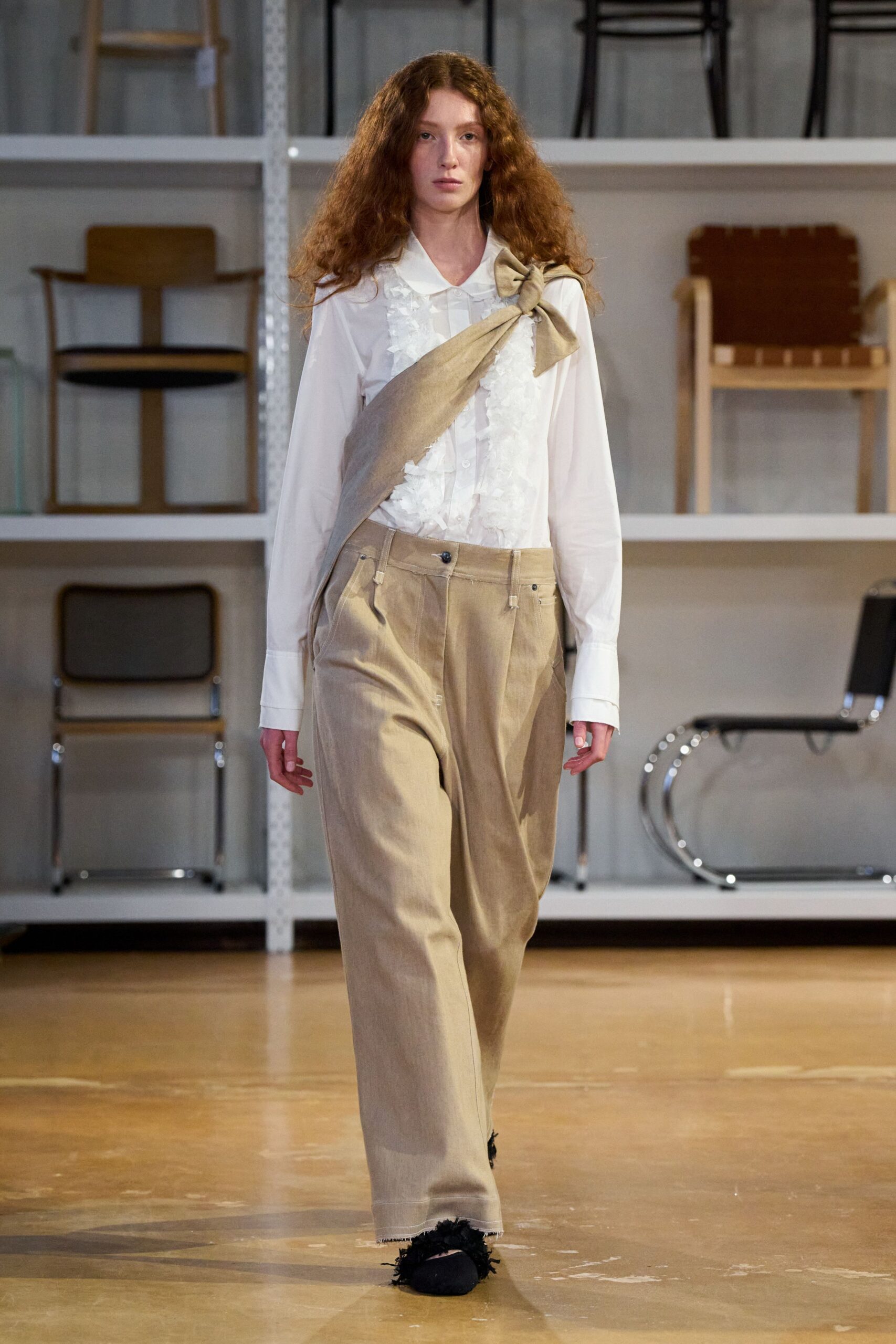 white shirt beige pants