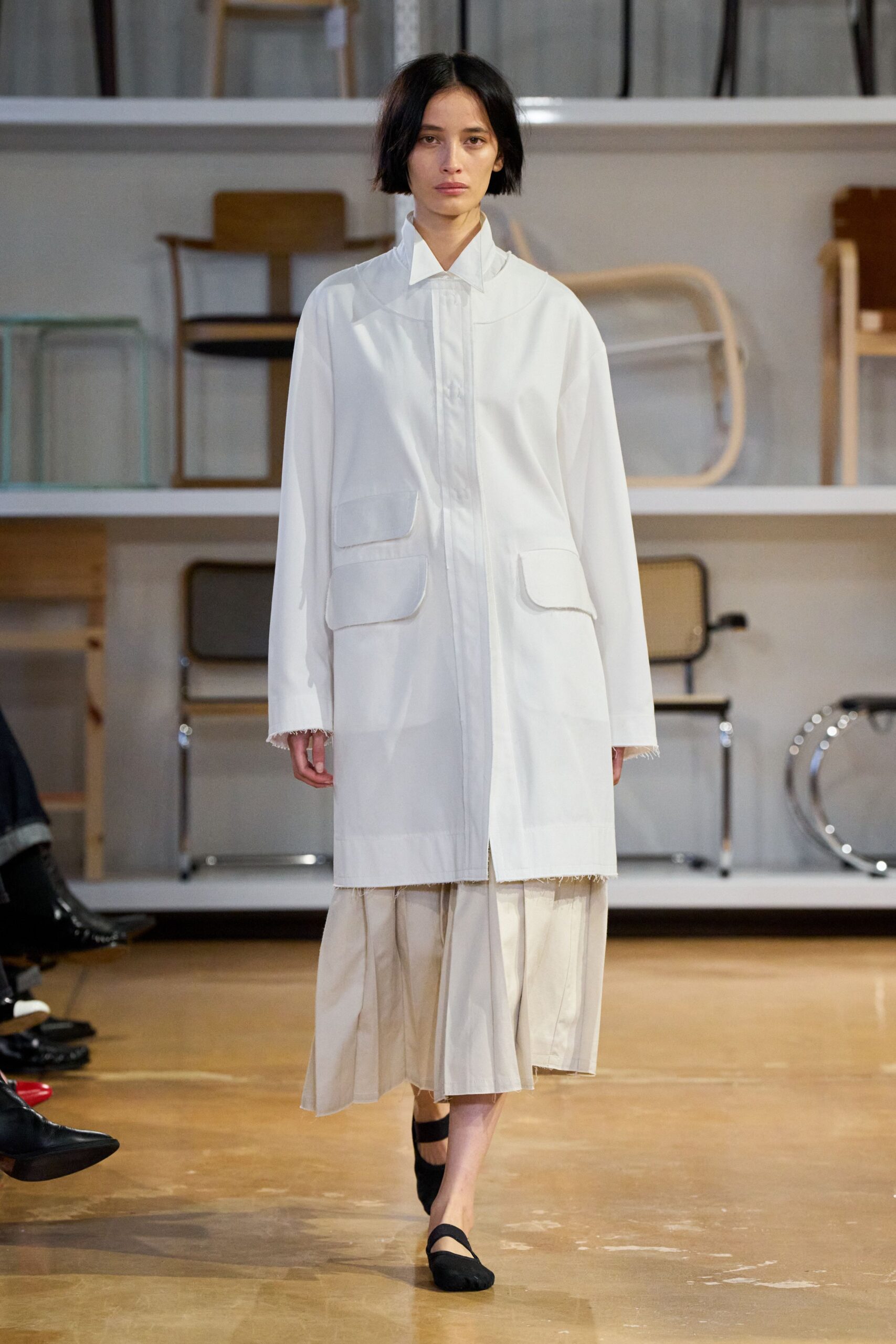 white relaxed coat beige pleated skirt