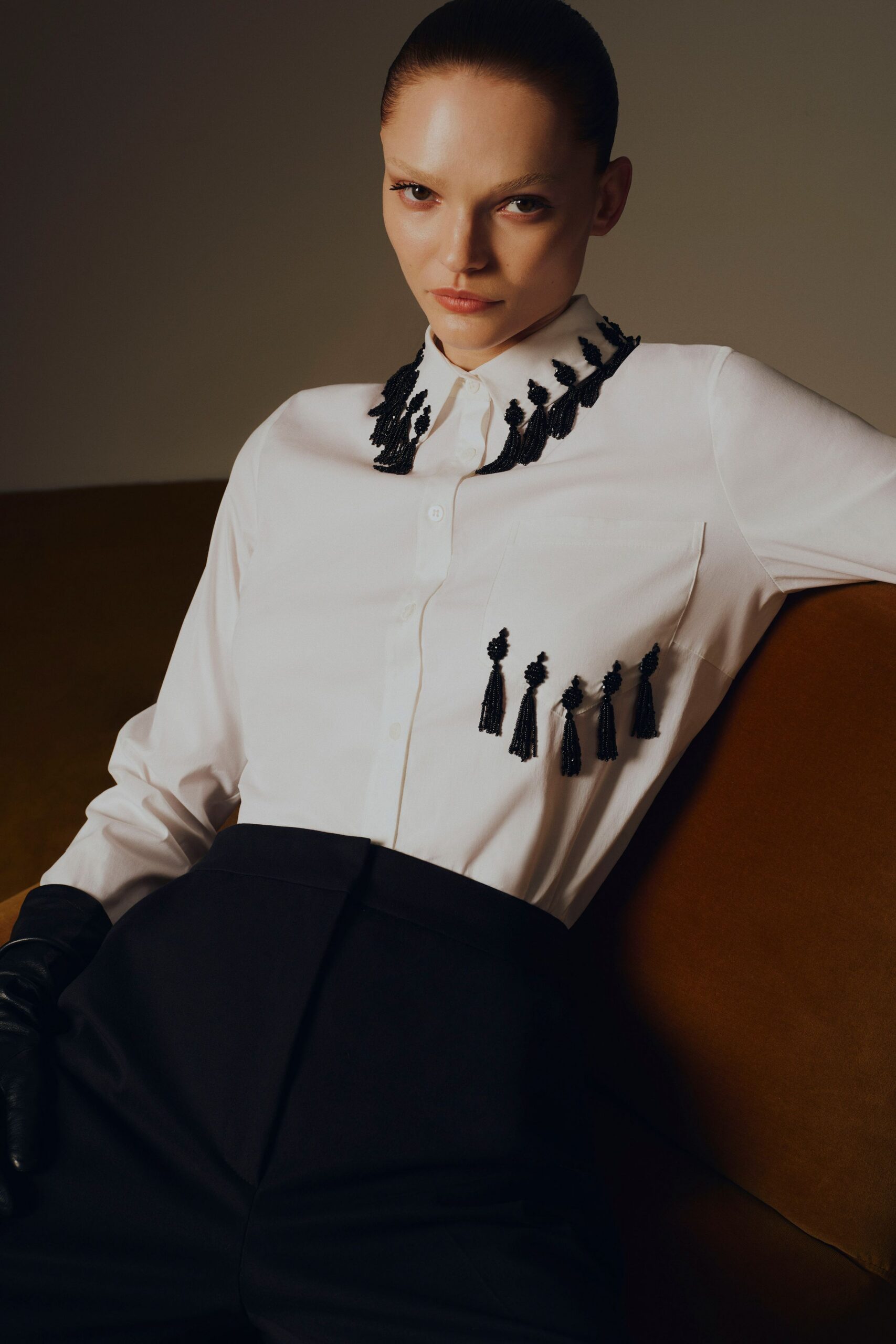 white fitted shirt with black pants
