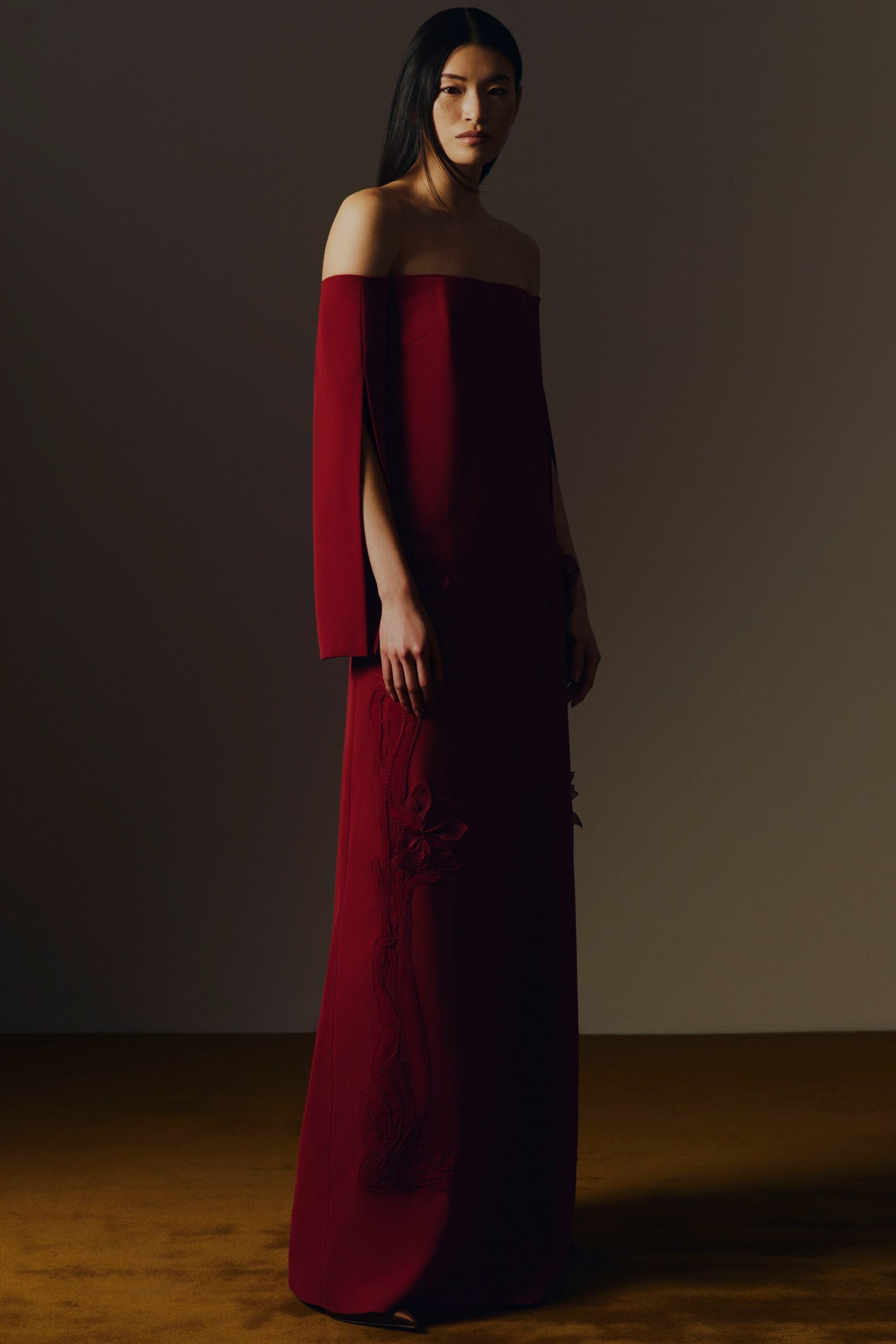 red silk strapless gown