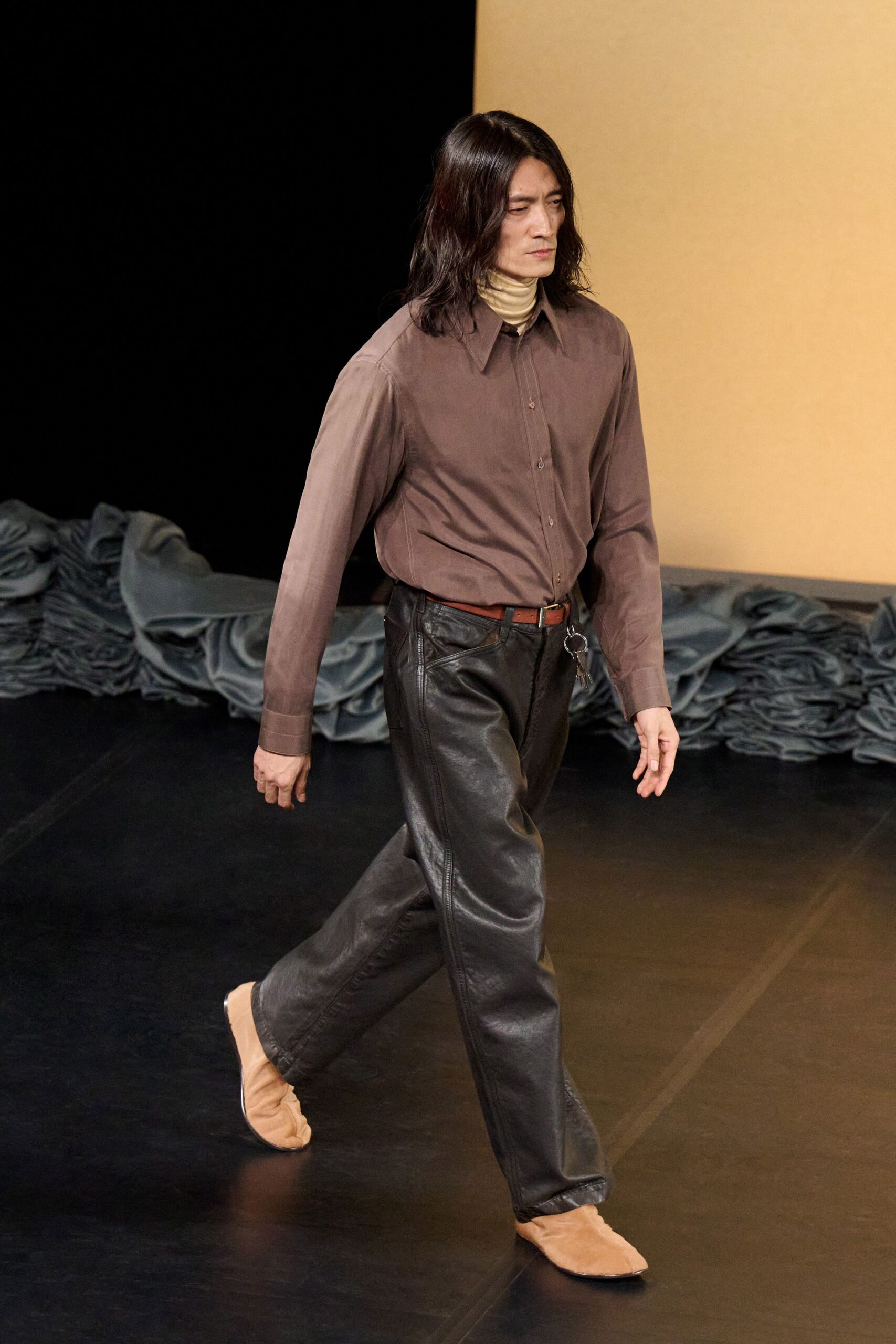 brown shirt black leather pants