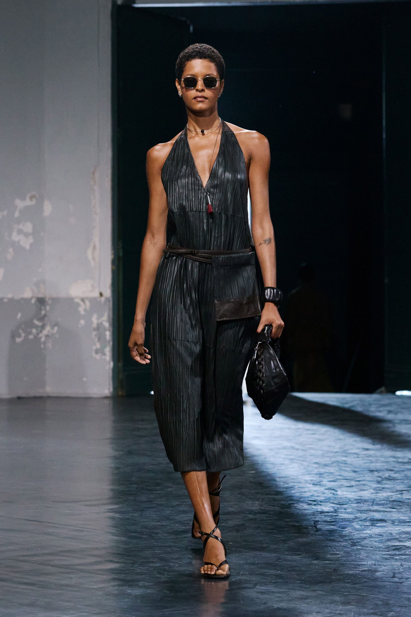 black silk sleeveless v-neck fitted pleated jumpsuit