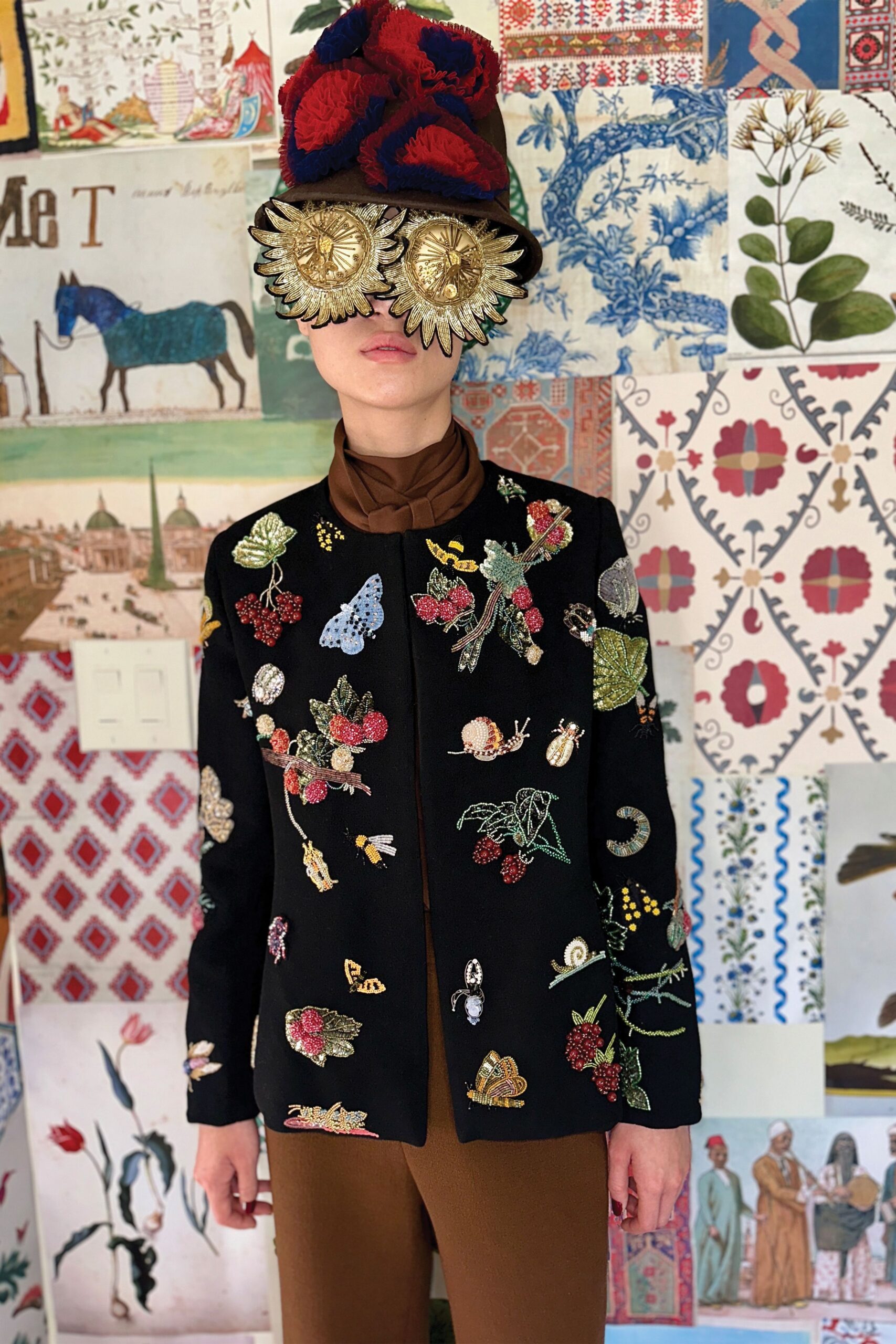 embroidered black jacket with brown top