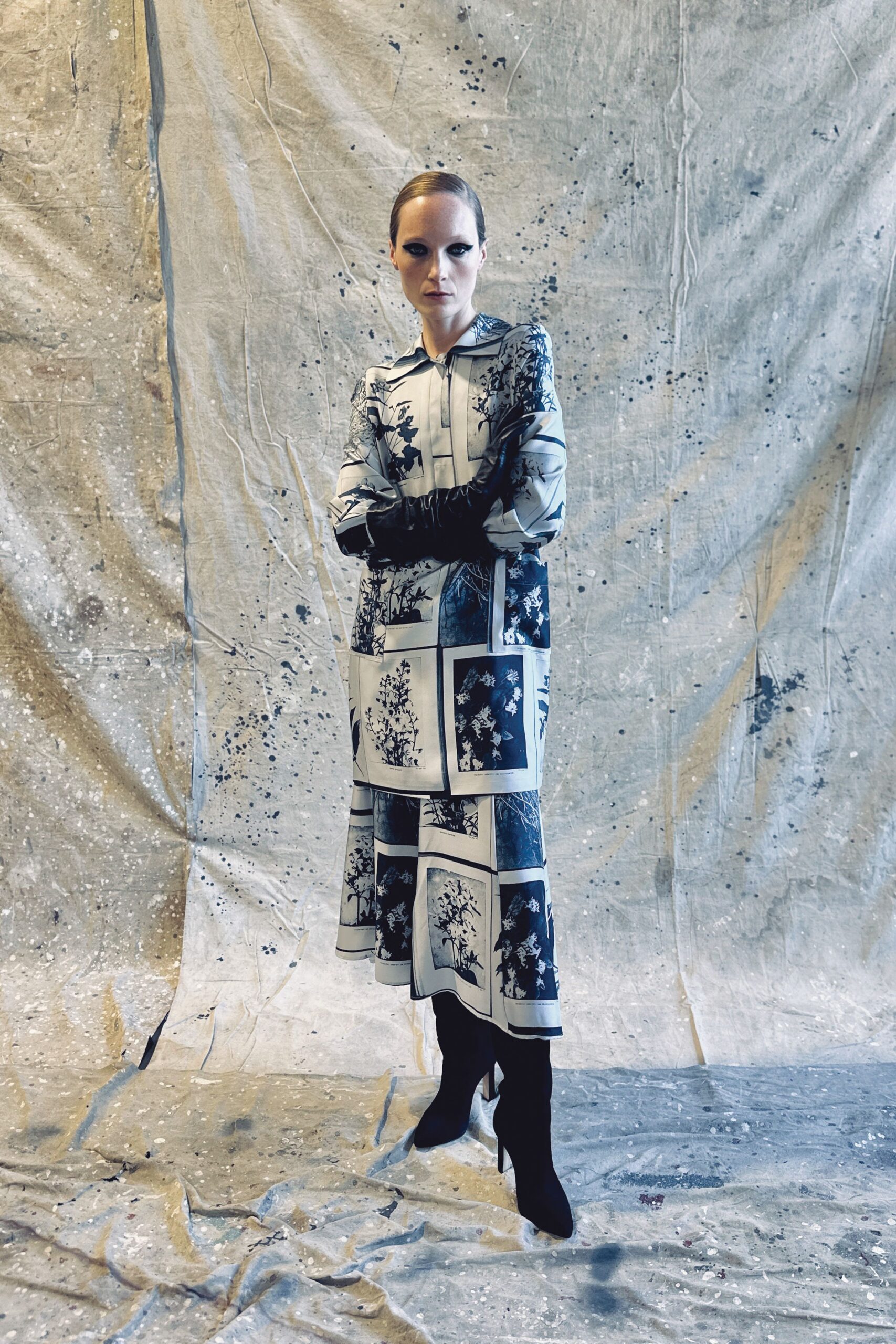 black and white printed midi dress with boots