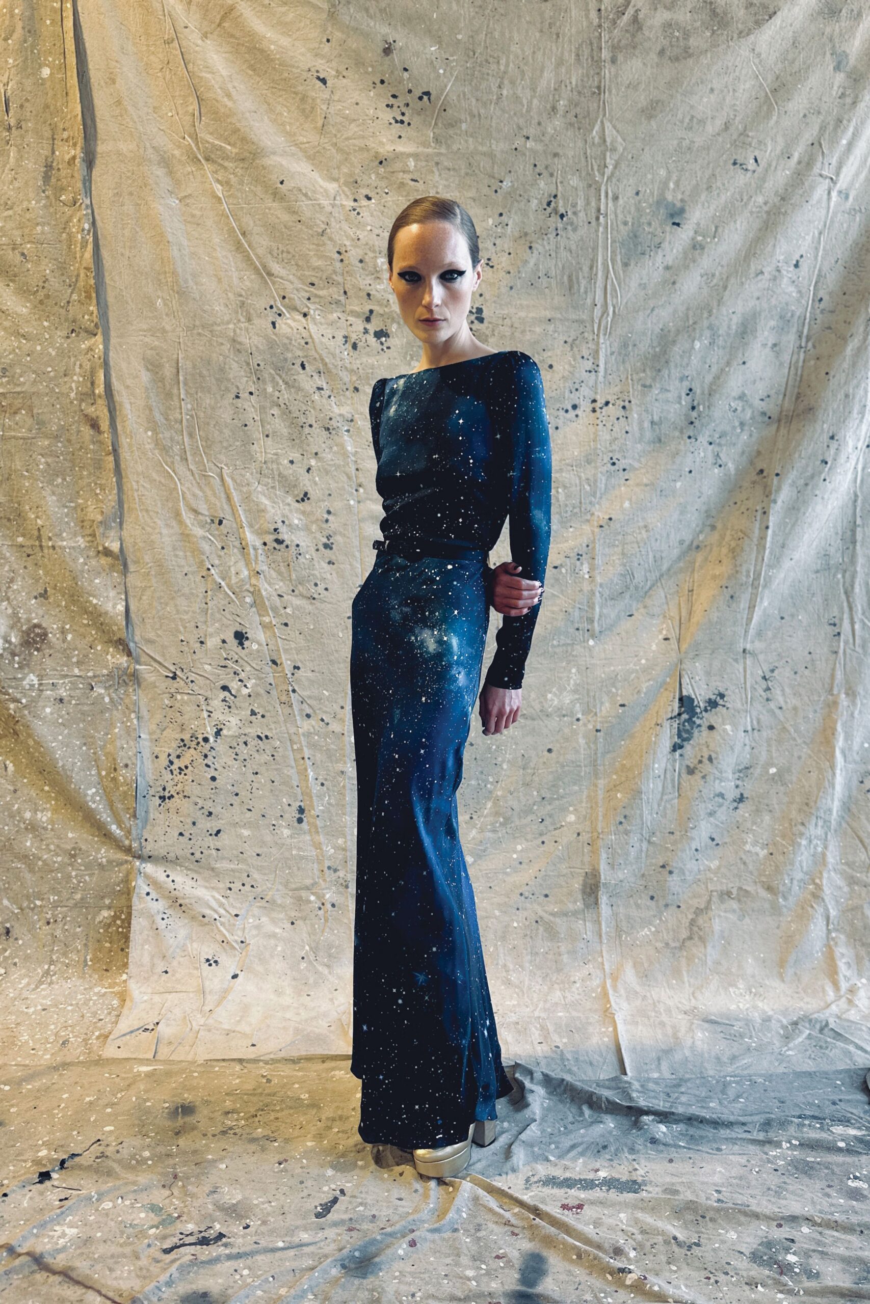 blue silk long-sleeve high-neck fitted embellished shiny gown