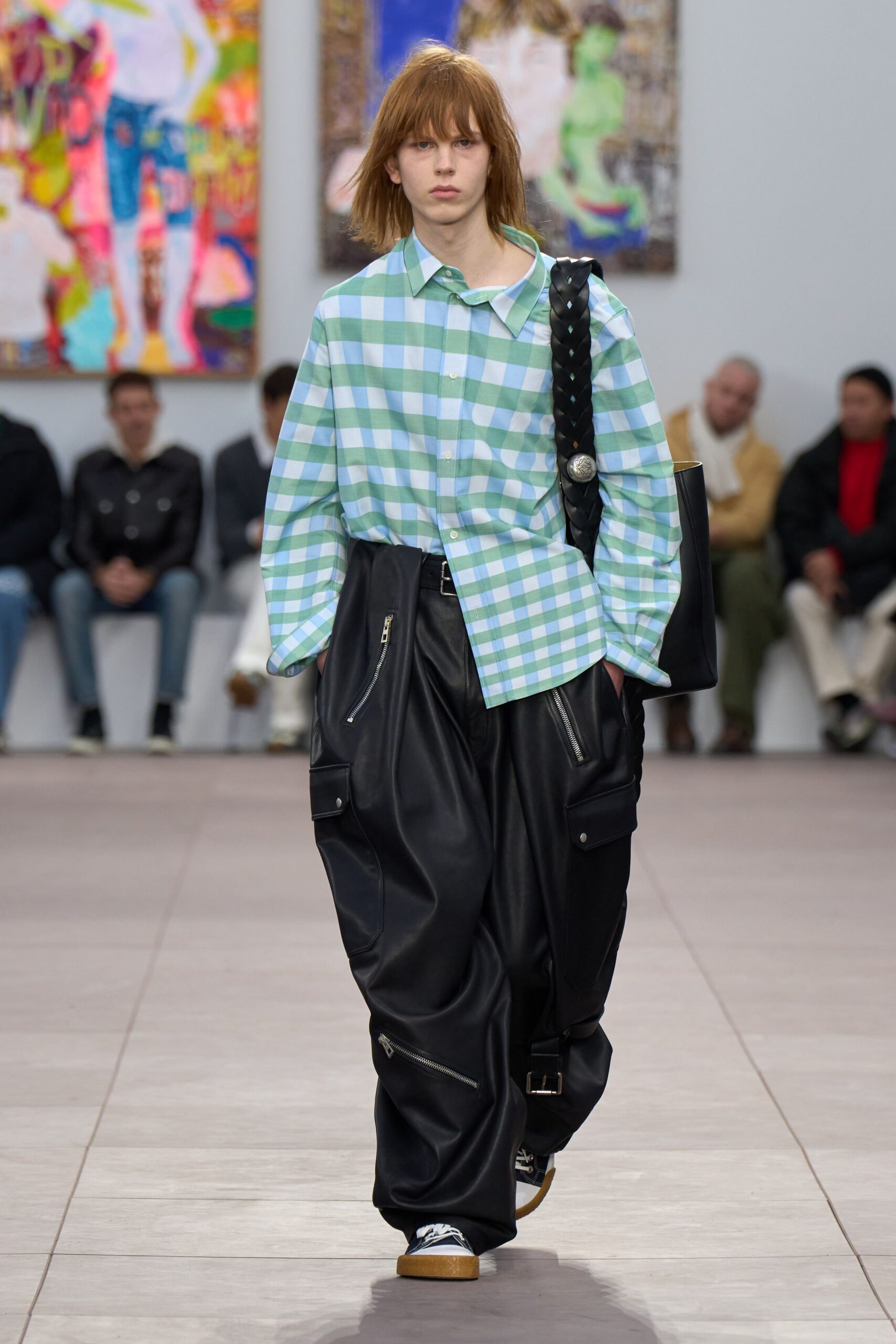 checked shirt and leather pants