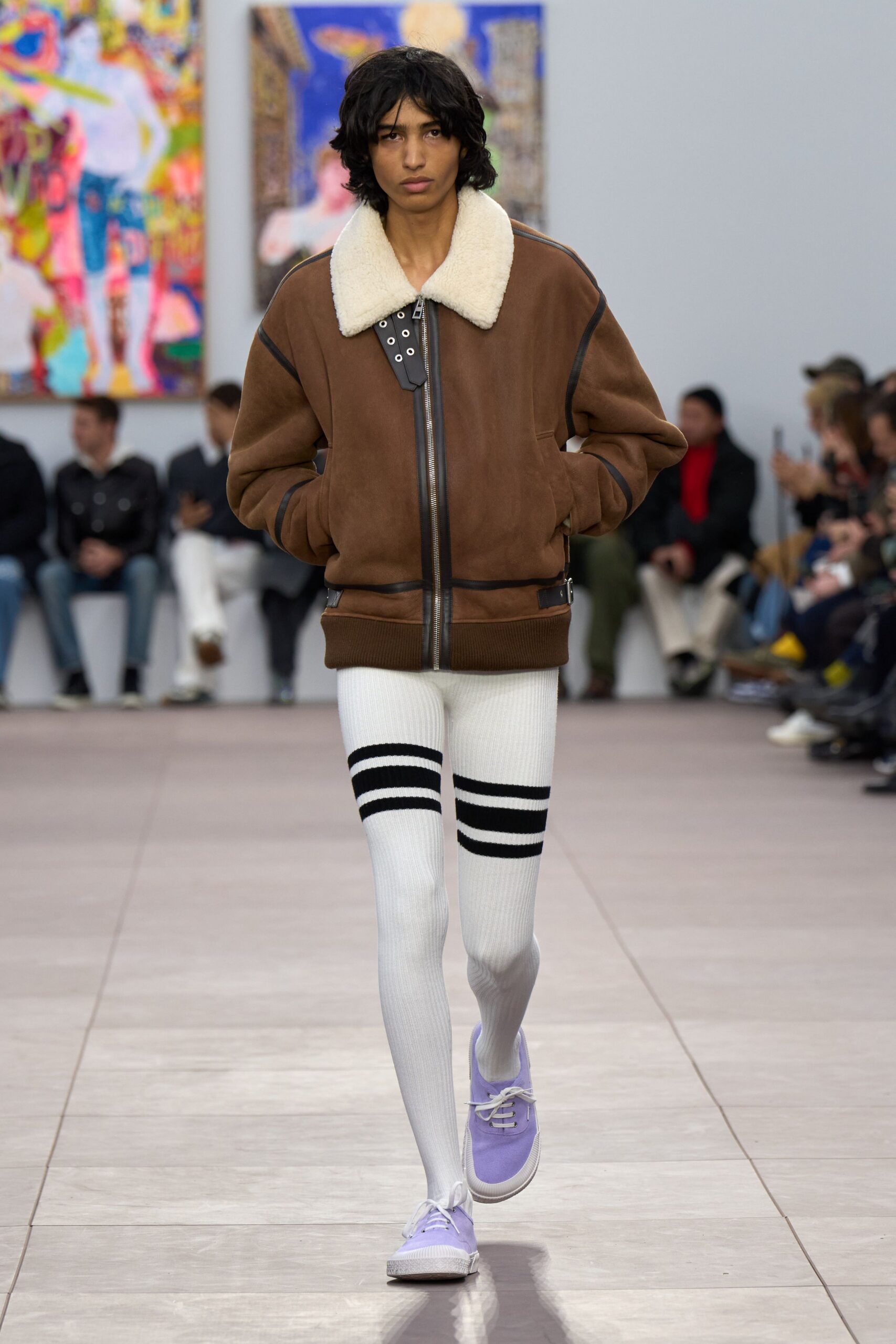 brown faux-fur jacket with white striped pants