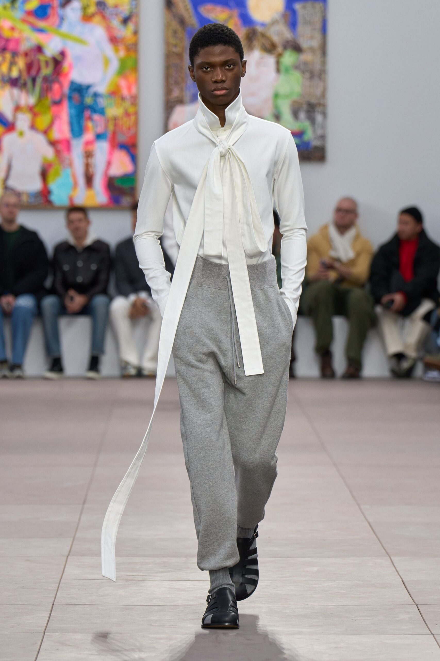 white fitted shirt gray relaxed pants