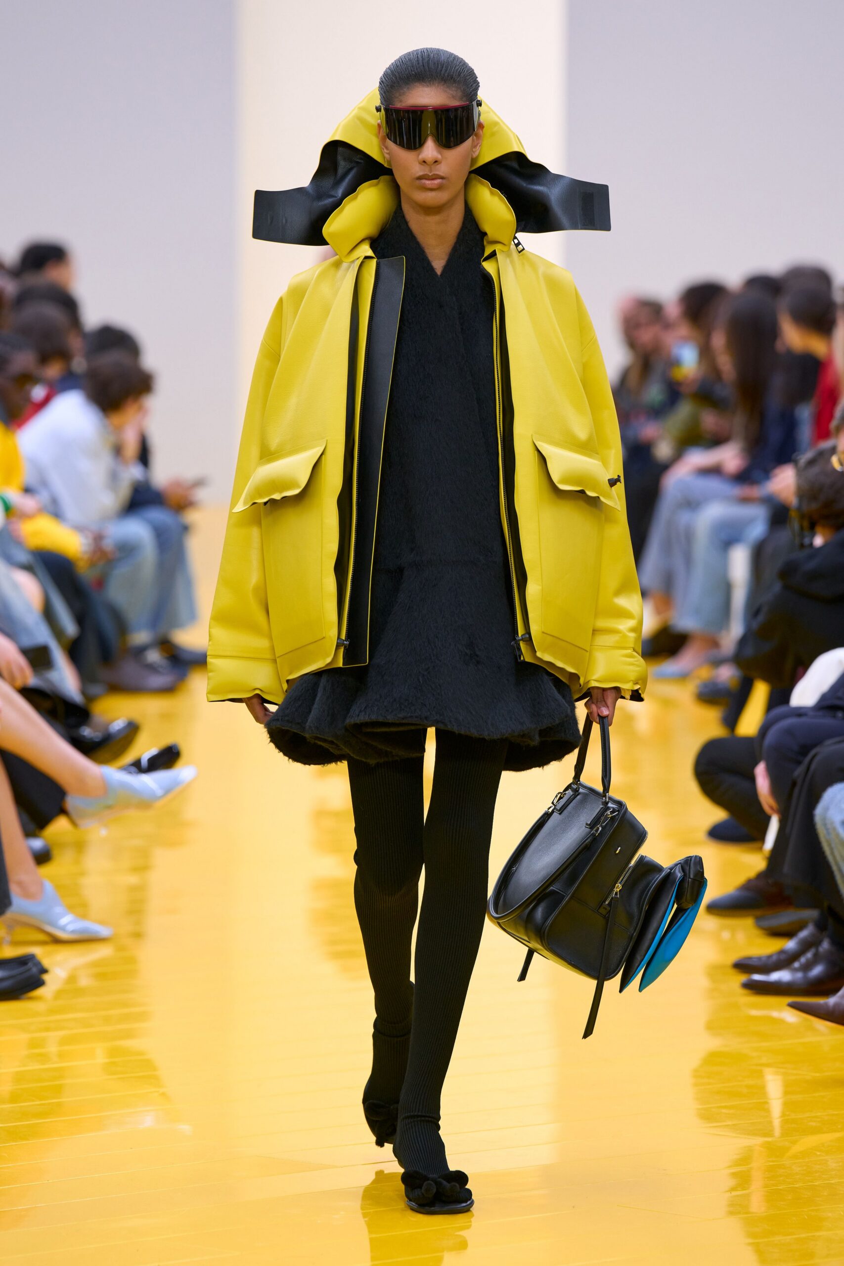 yellow oversized coat black dress