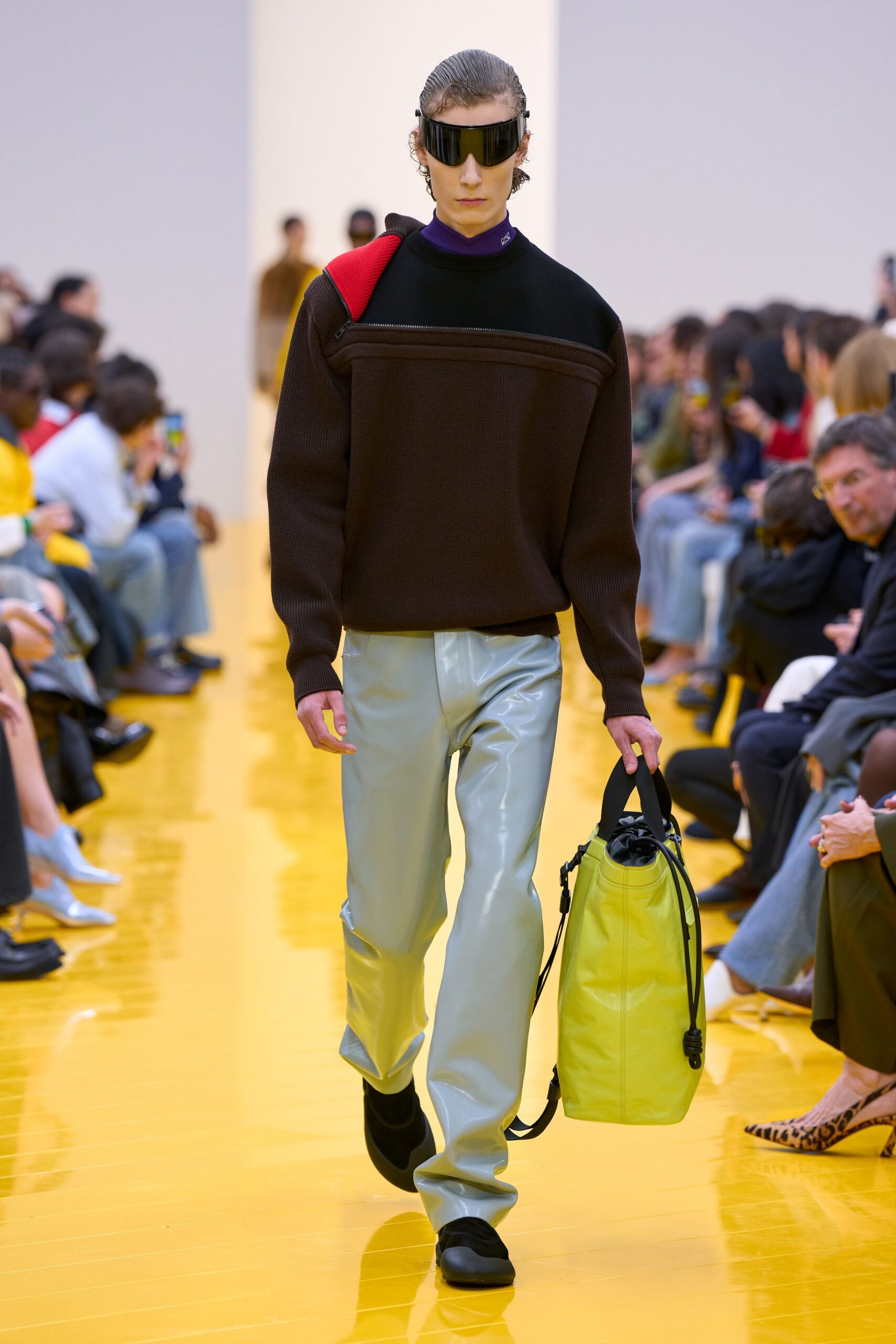 black brown fitted sweater with vinyl pants