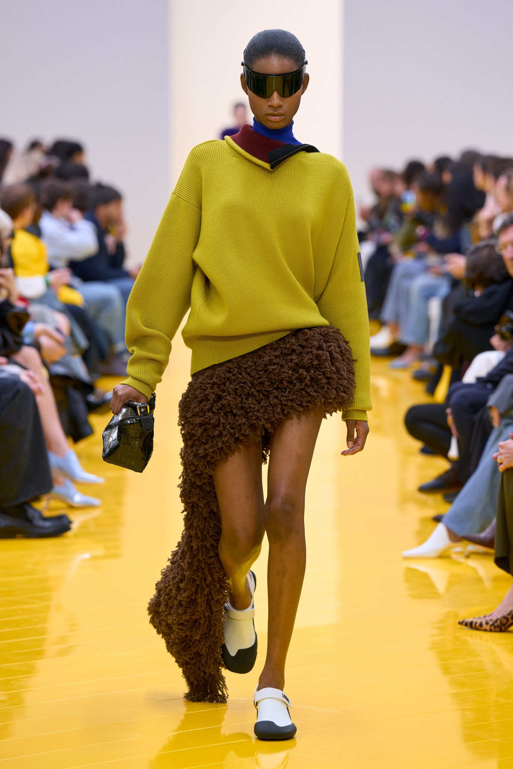 green oversized sweater with brown skirt
