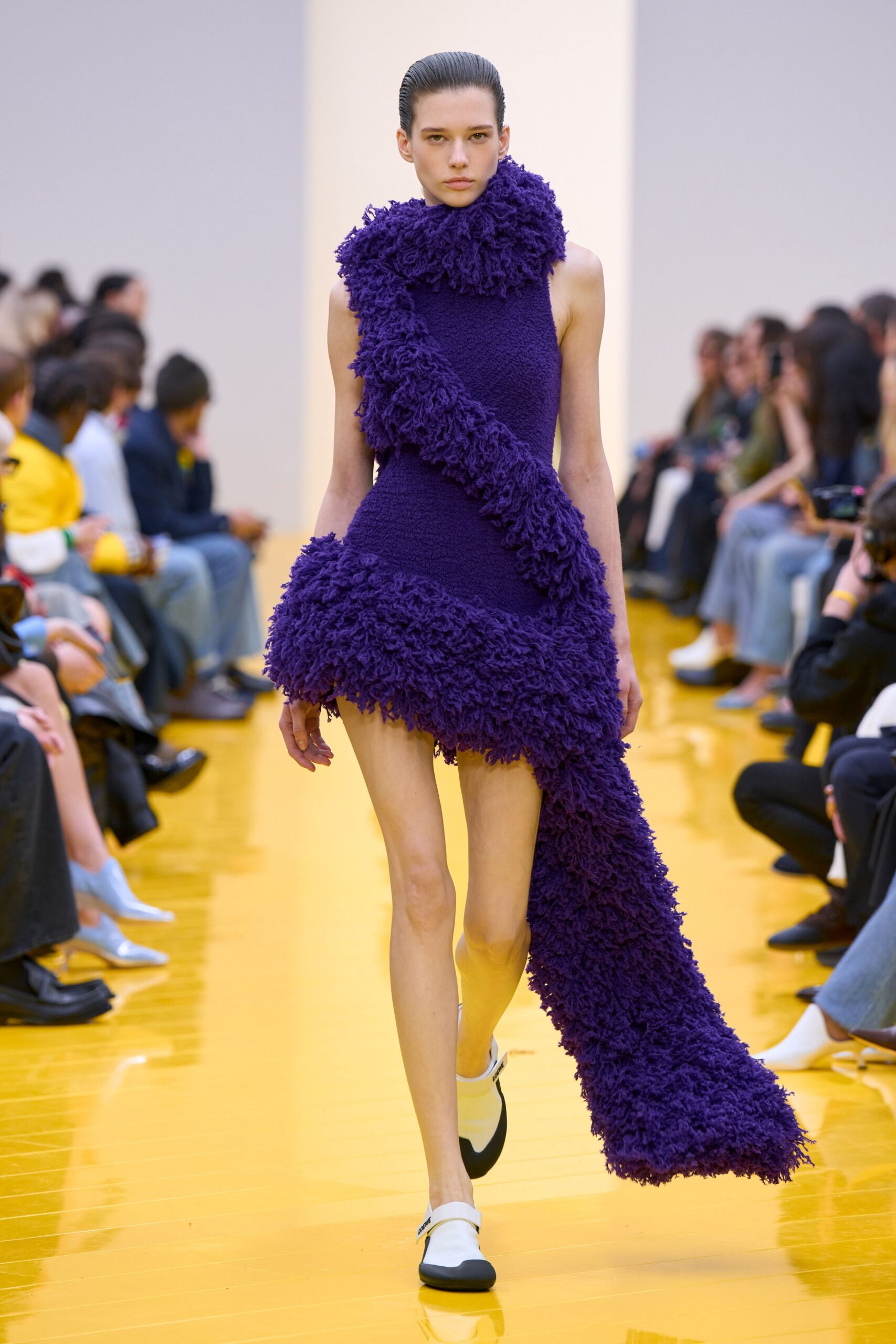 purple ruffled mini dress with white shoes