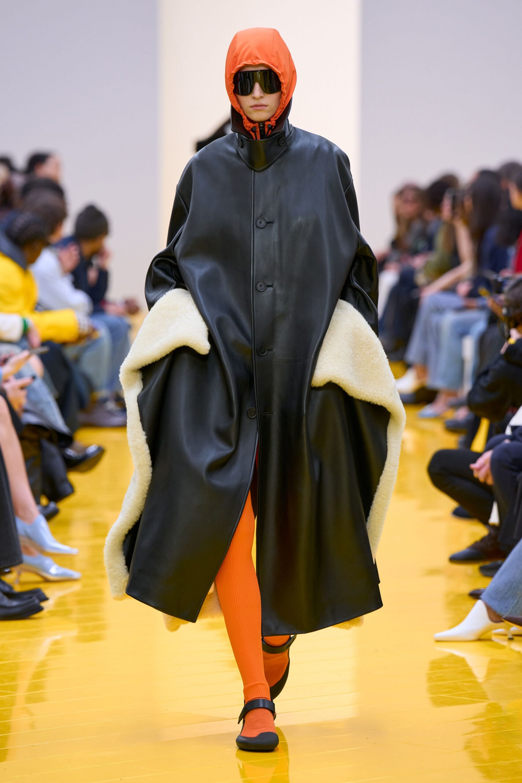 black leather coat with orange top