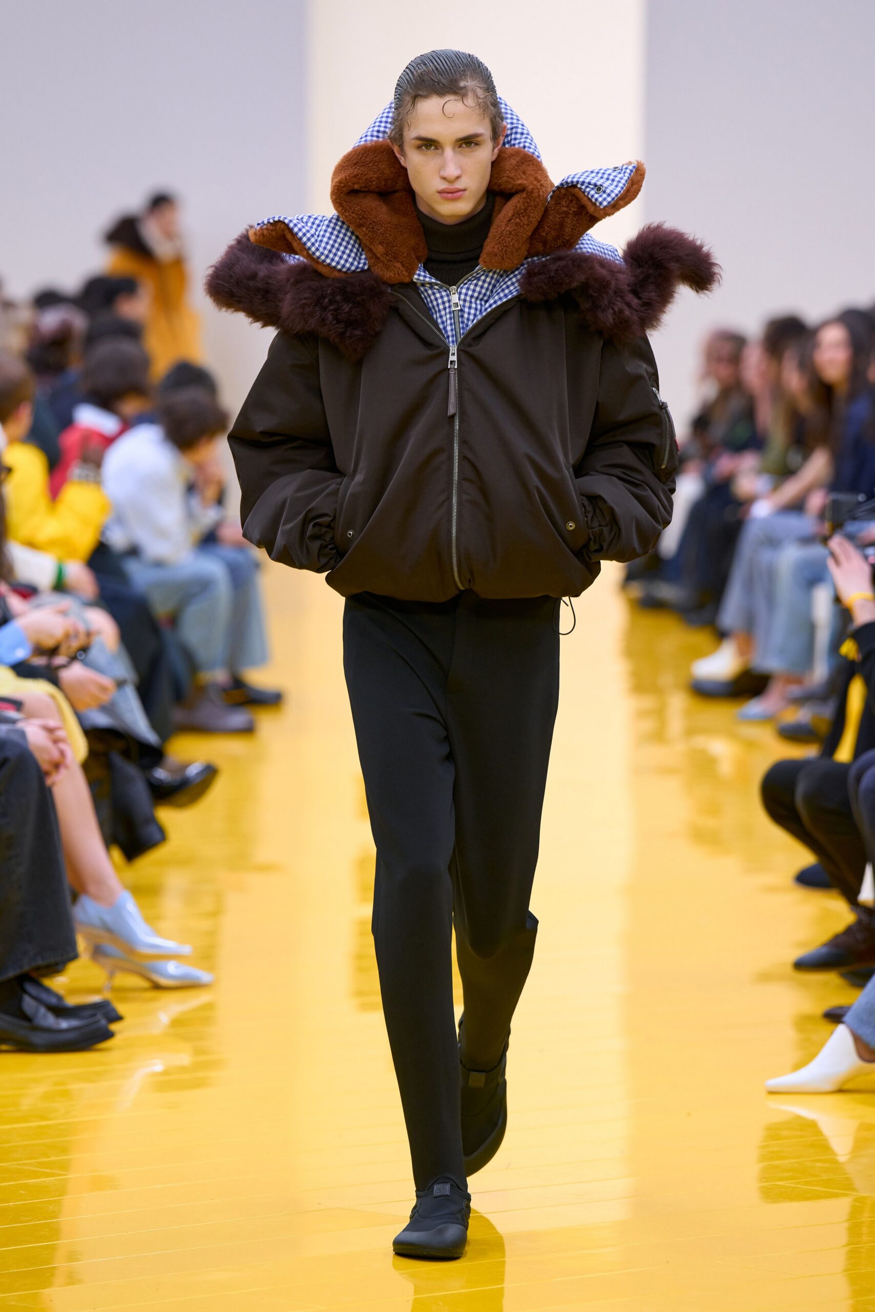 brown faux-fur jacket with black pants