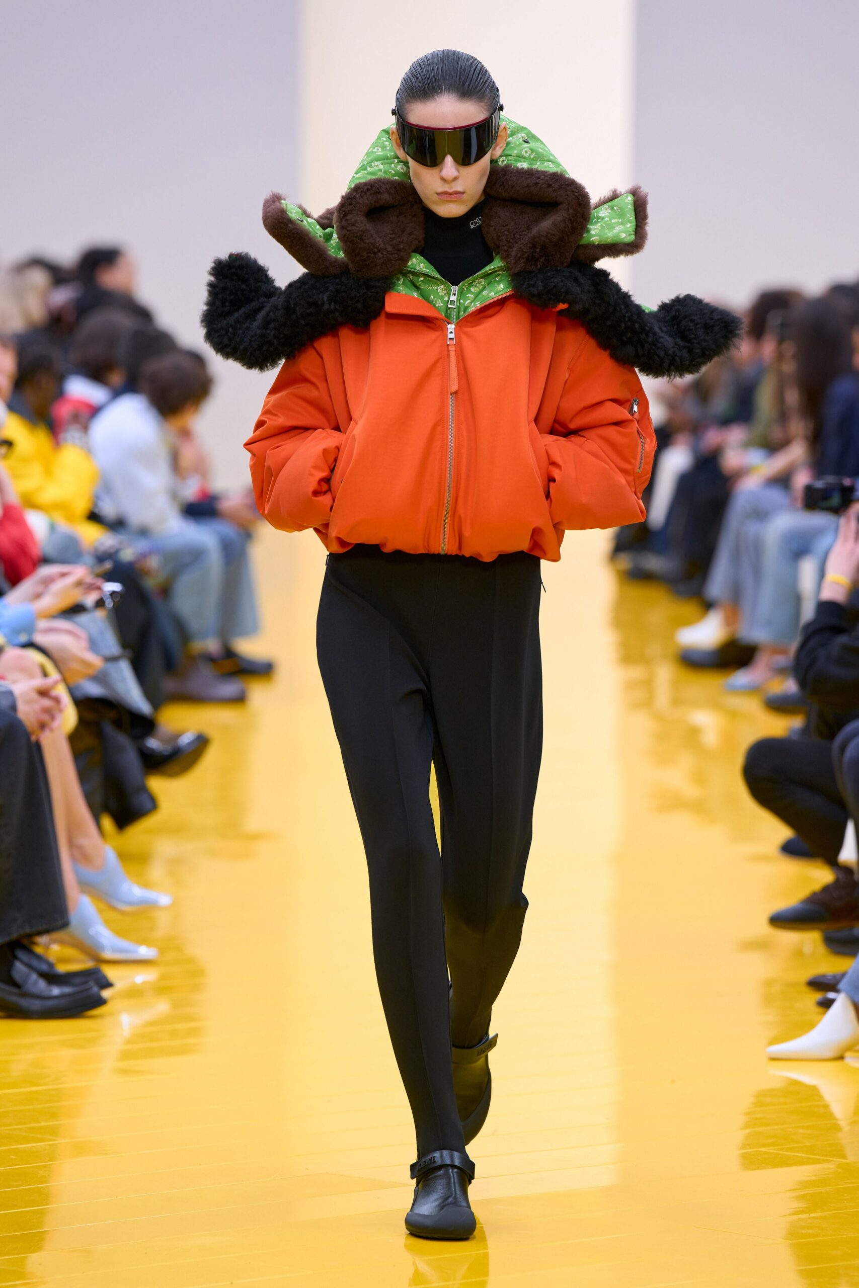 orange relaxed jacket with black pants