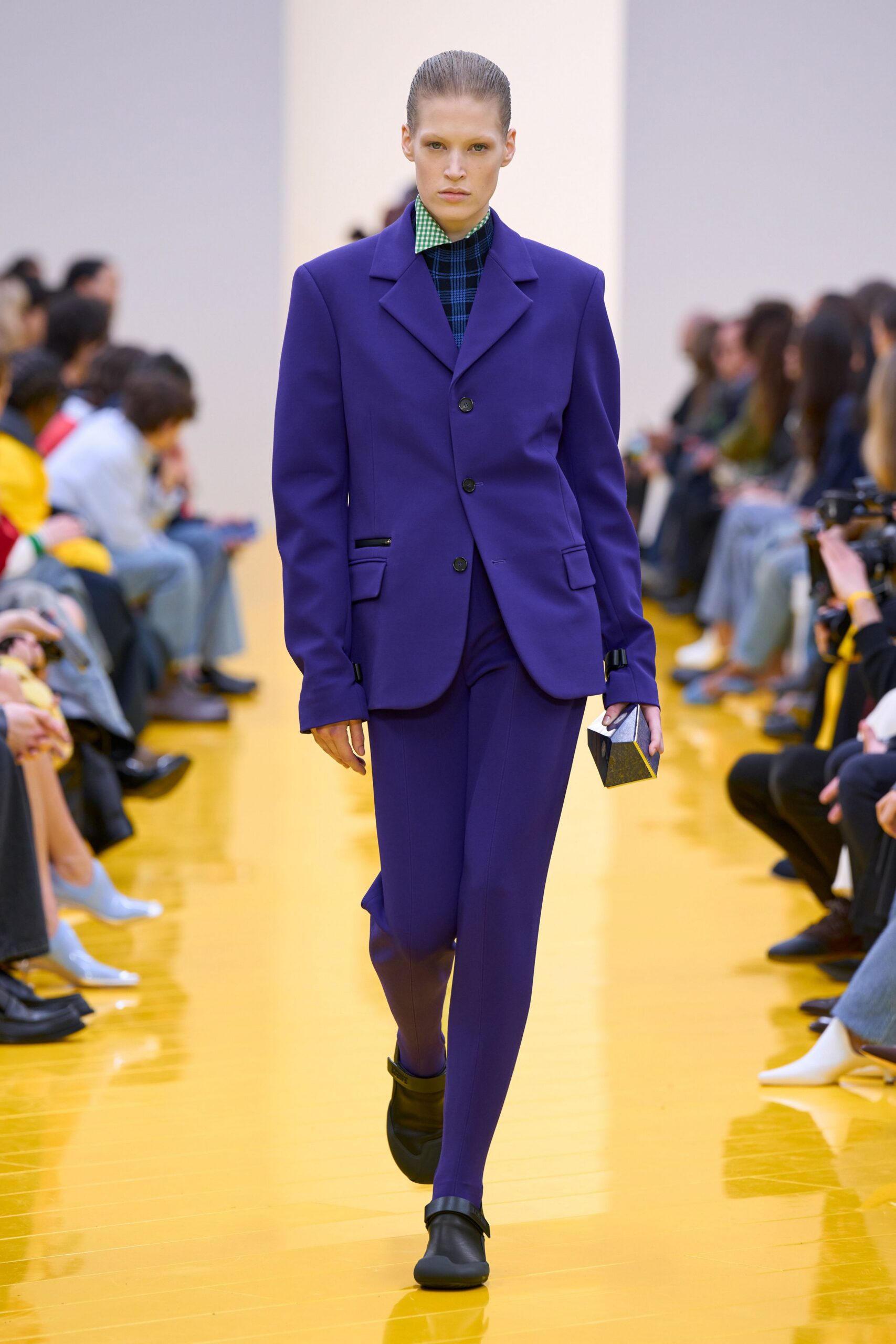 purple tailored suit with green shirt