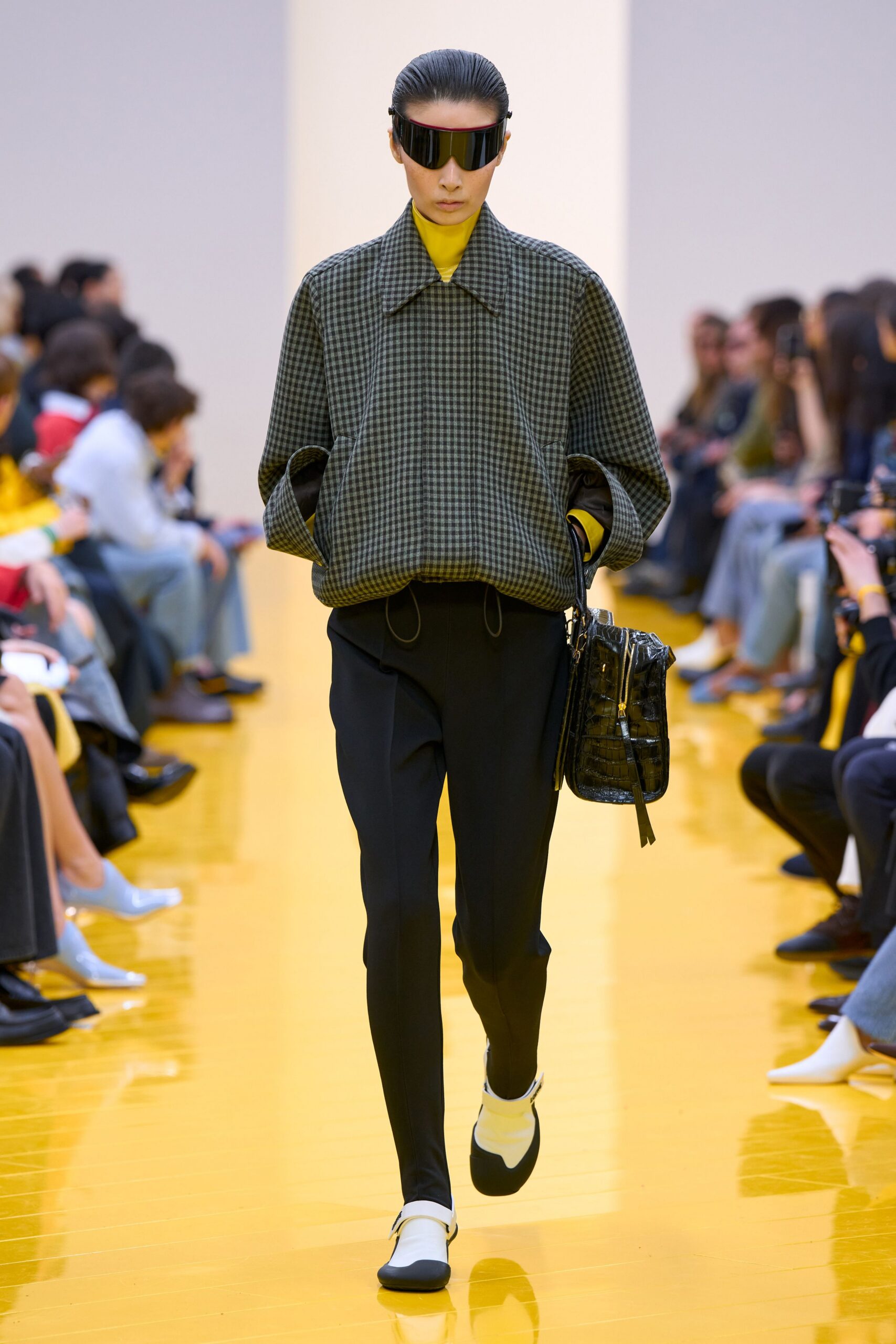 green checked jacket with black pants