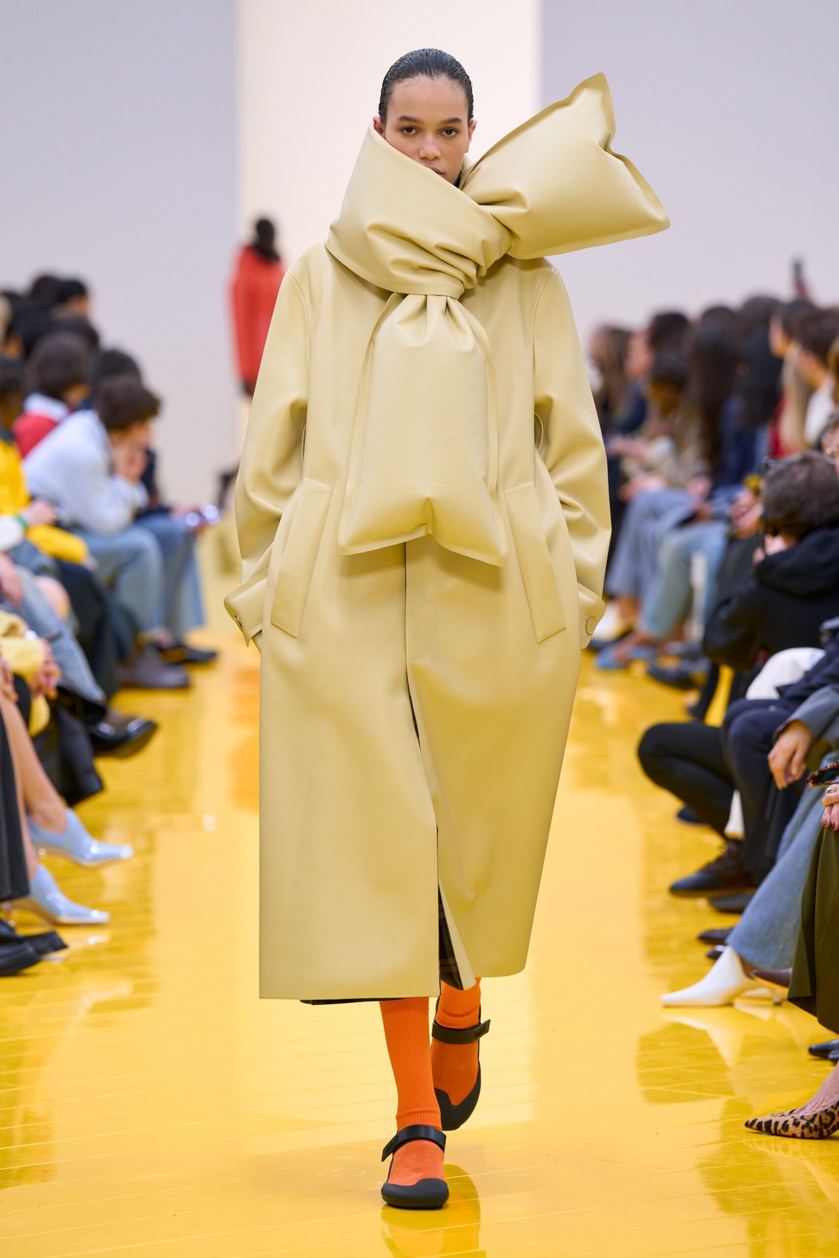 beige oversized coat with black pants
