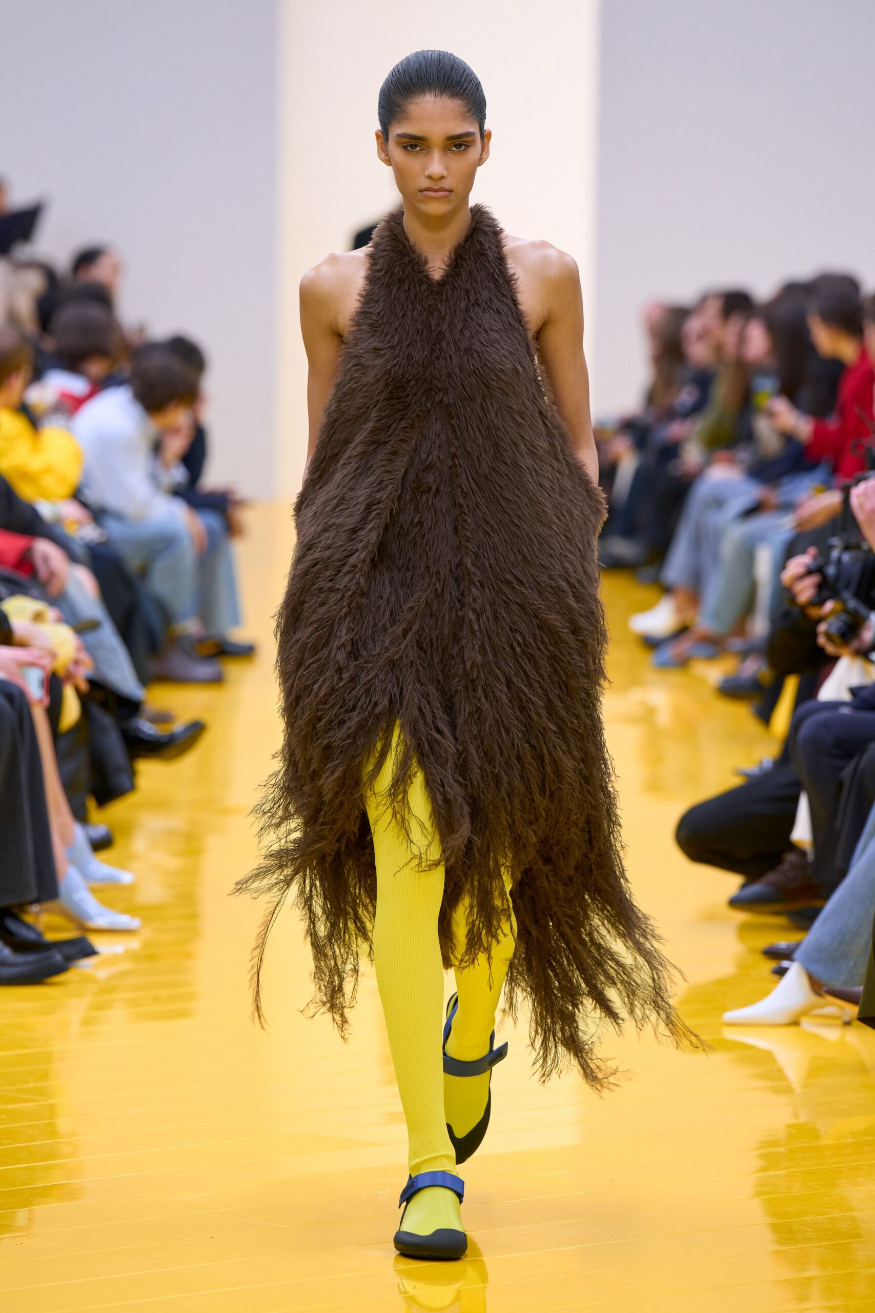 brown fur sleeveless dress with yellow pants