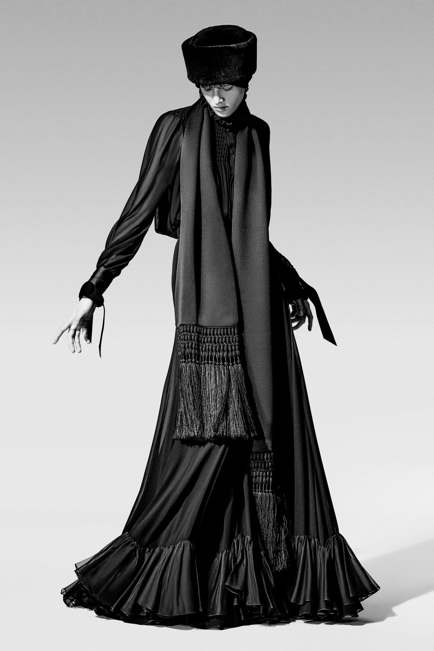 black silk long-sleeve collared fitted ruffled tiered gown