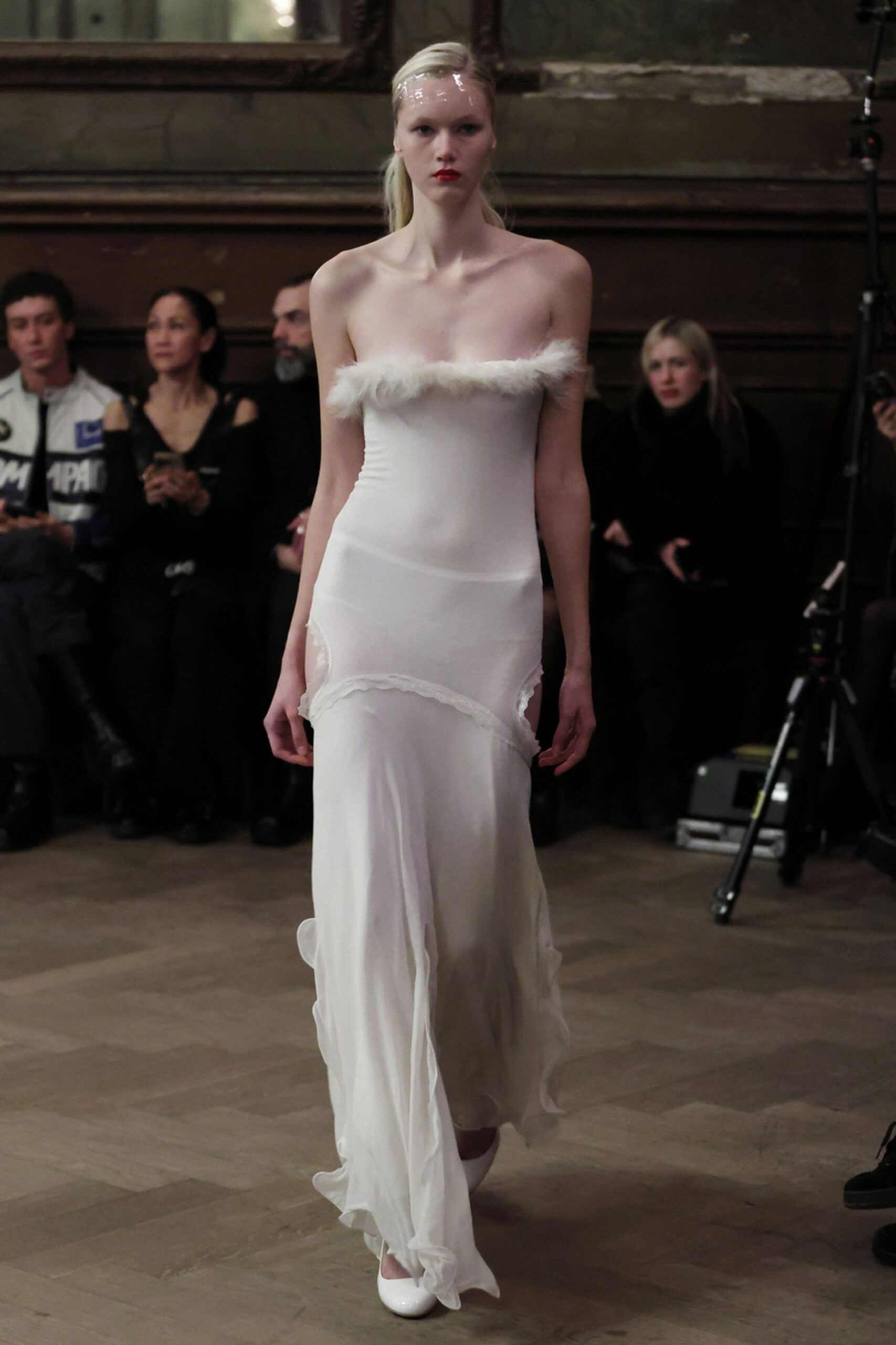 white silk sleeveless off-shoulder fitted draped flowing gown
