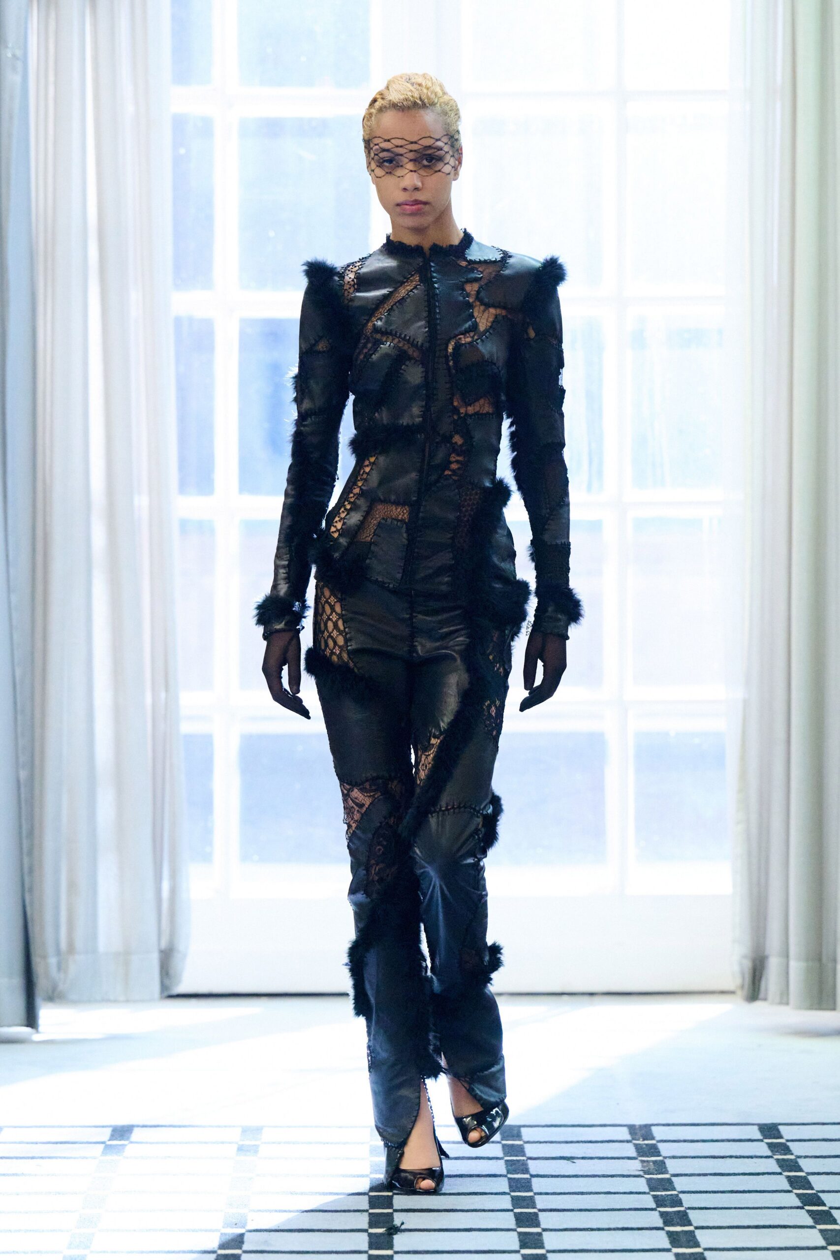 black leather long-sleeve cutout fitted zippered fringed catsuit