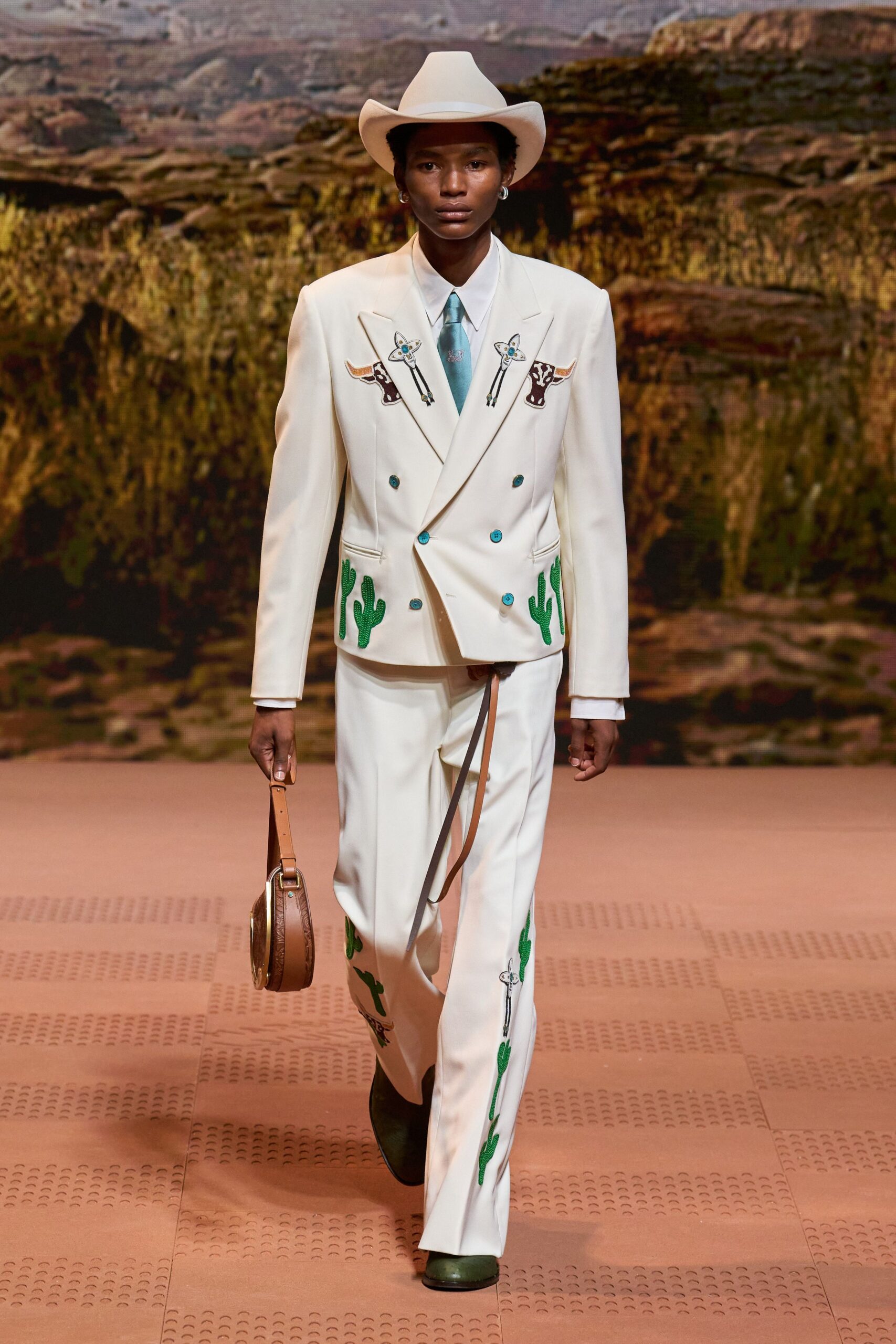 white tailored suit with hat