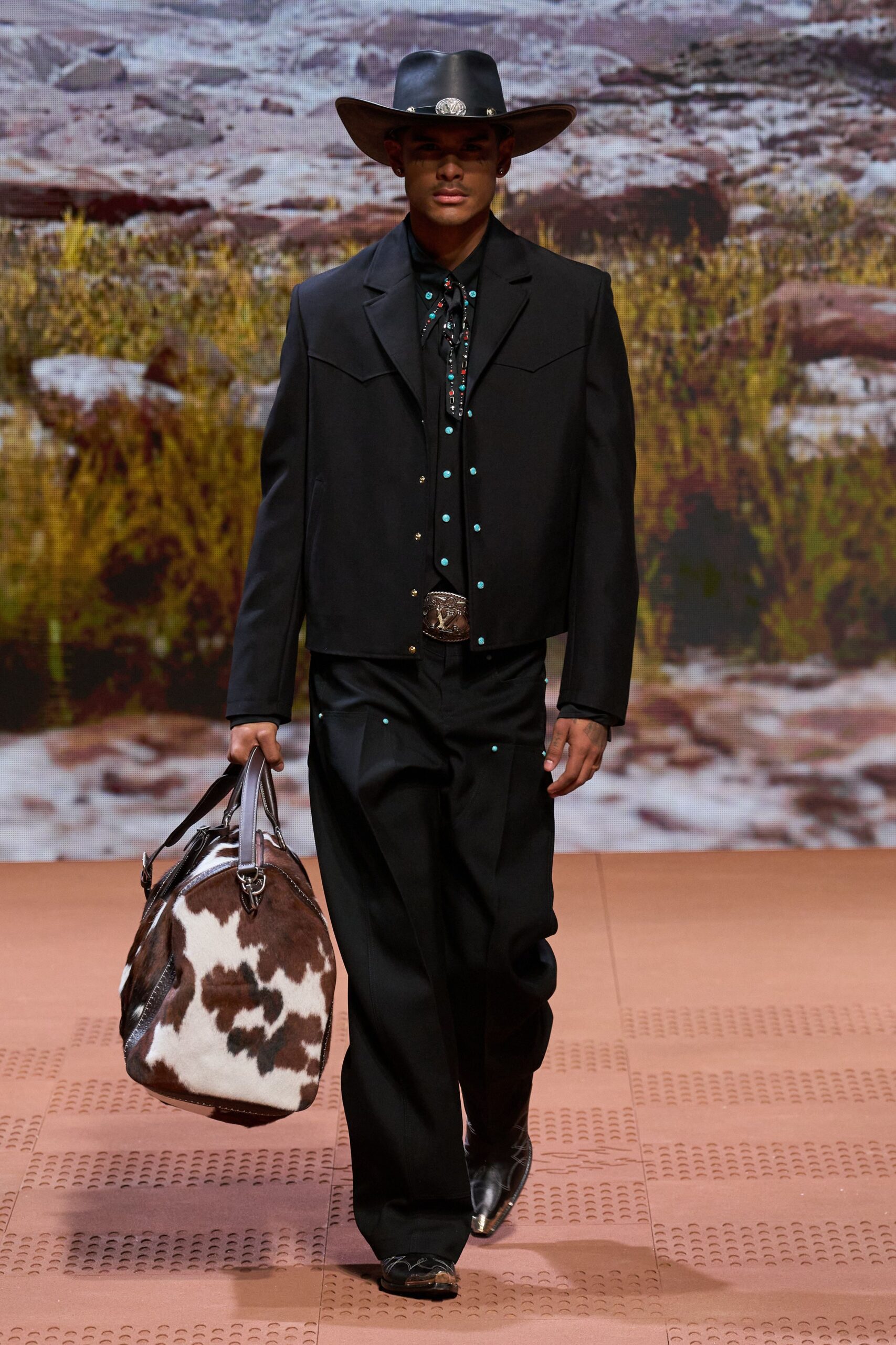 black fitted jacket with animal-print bag