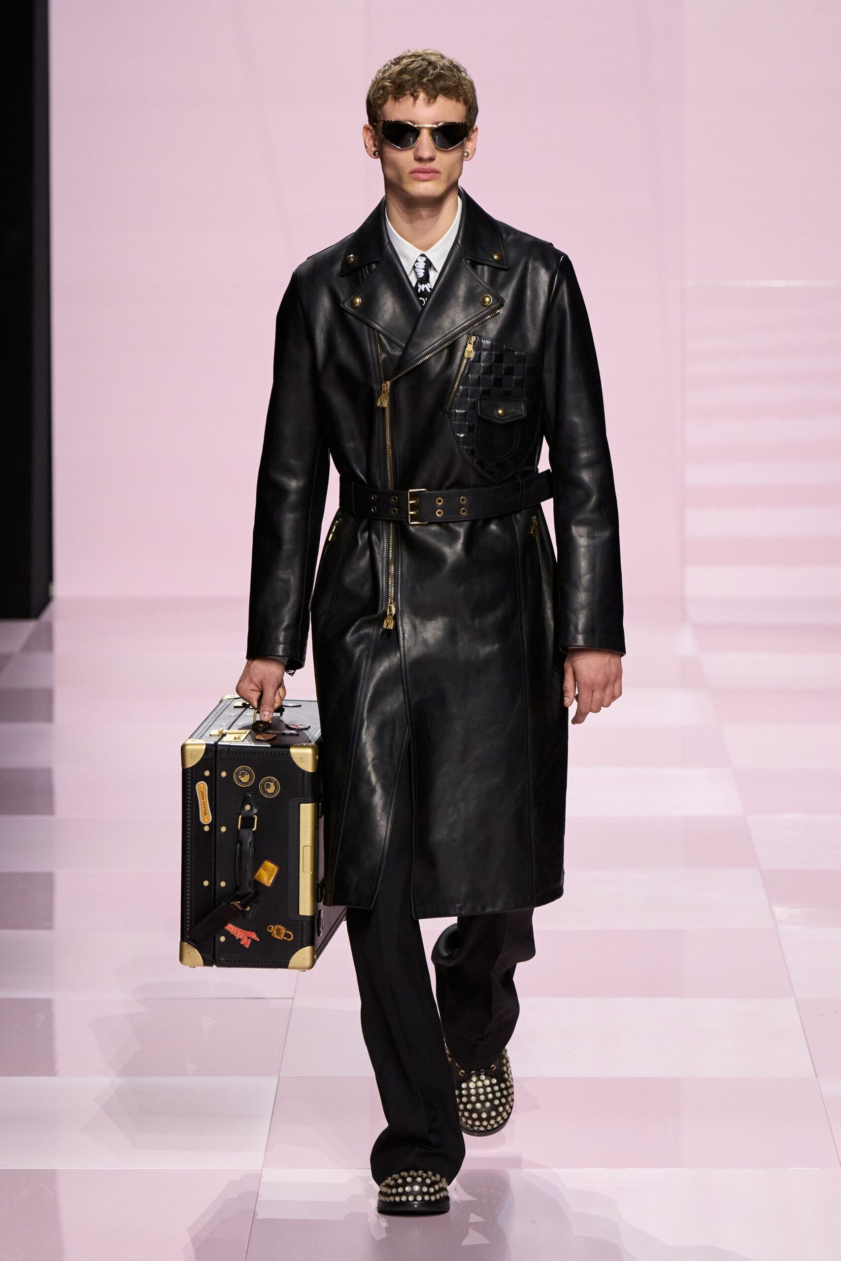 black leather long-sleeve collared fitted zippered belted coat