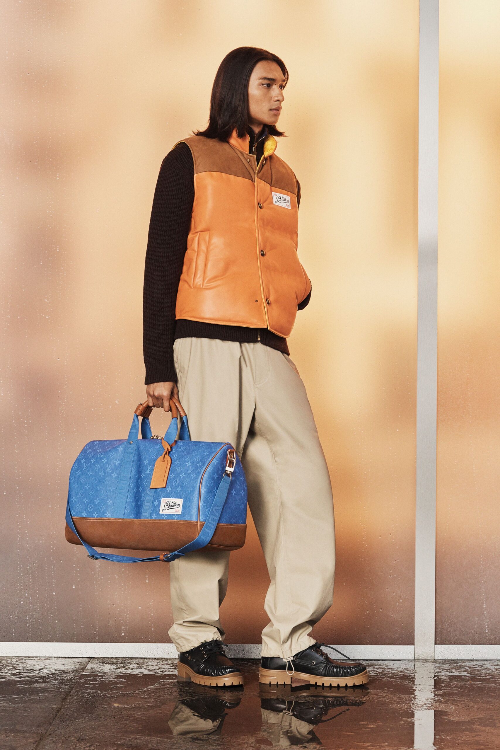 blue leather zippered bag