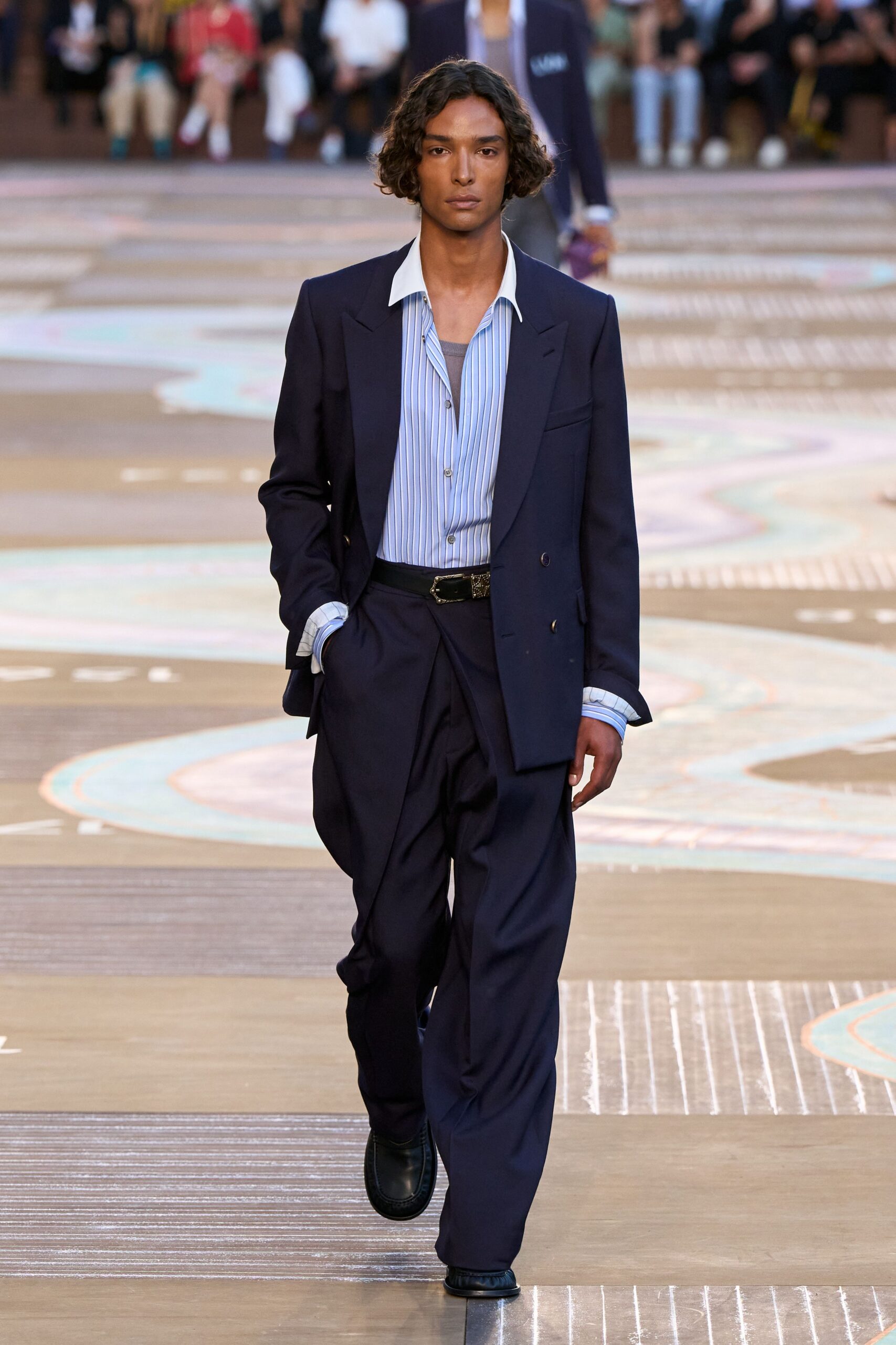 navy tailored suit with blue shirt