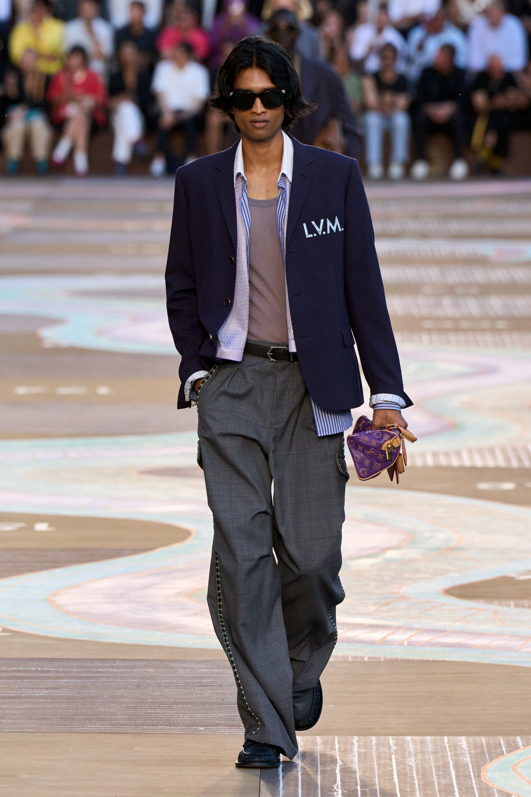 tailored navy blazer with gray pants