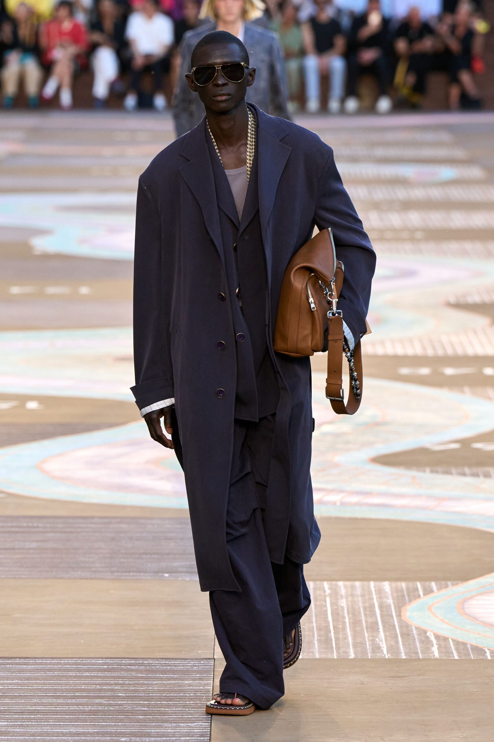 black relaxed suit with gray shirt