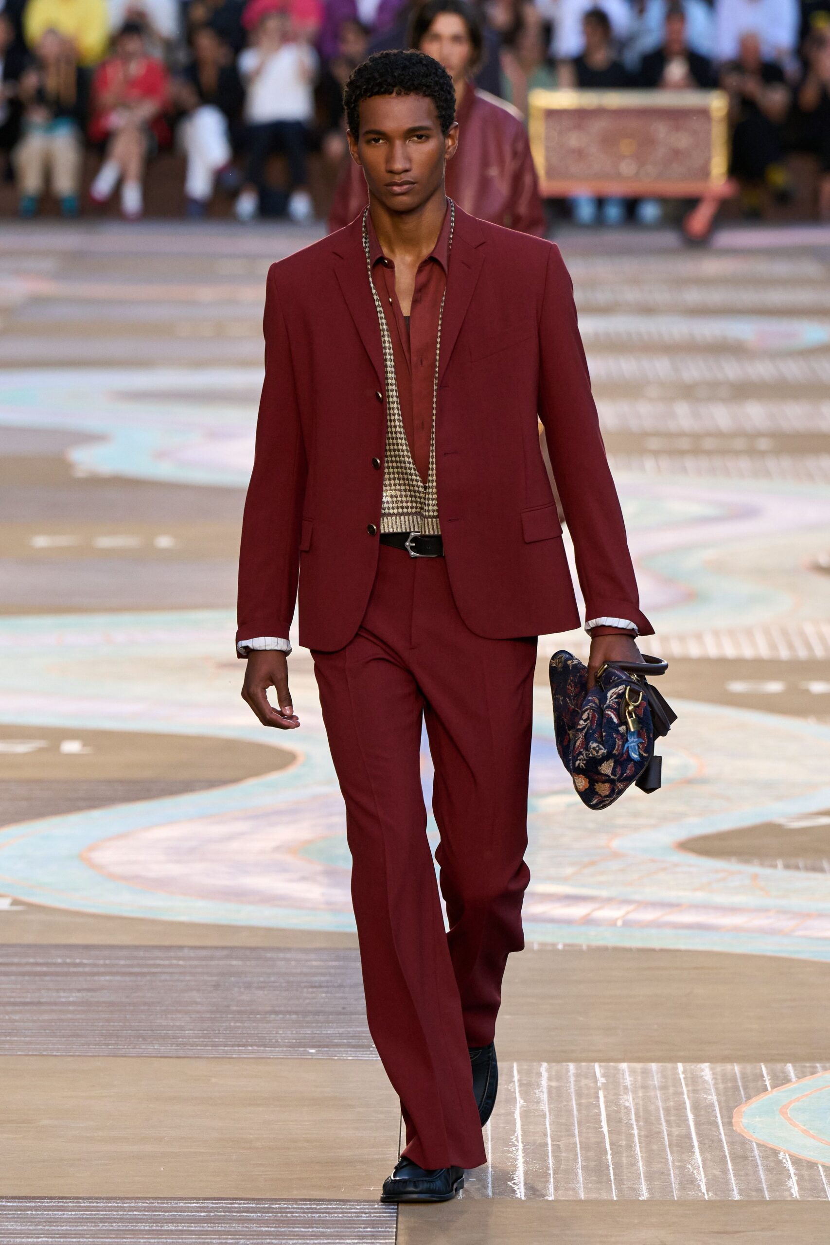 red long-sleeve collared tailored buttoned suit